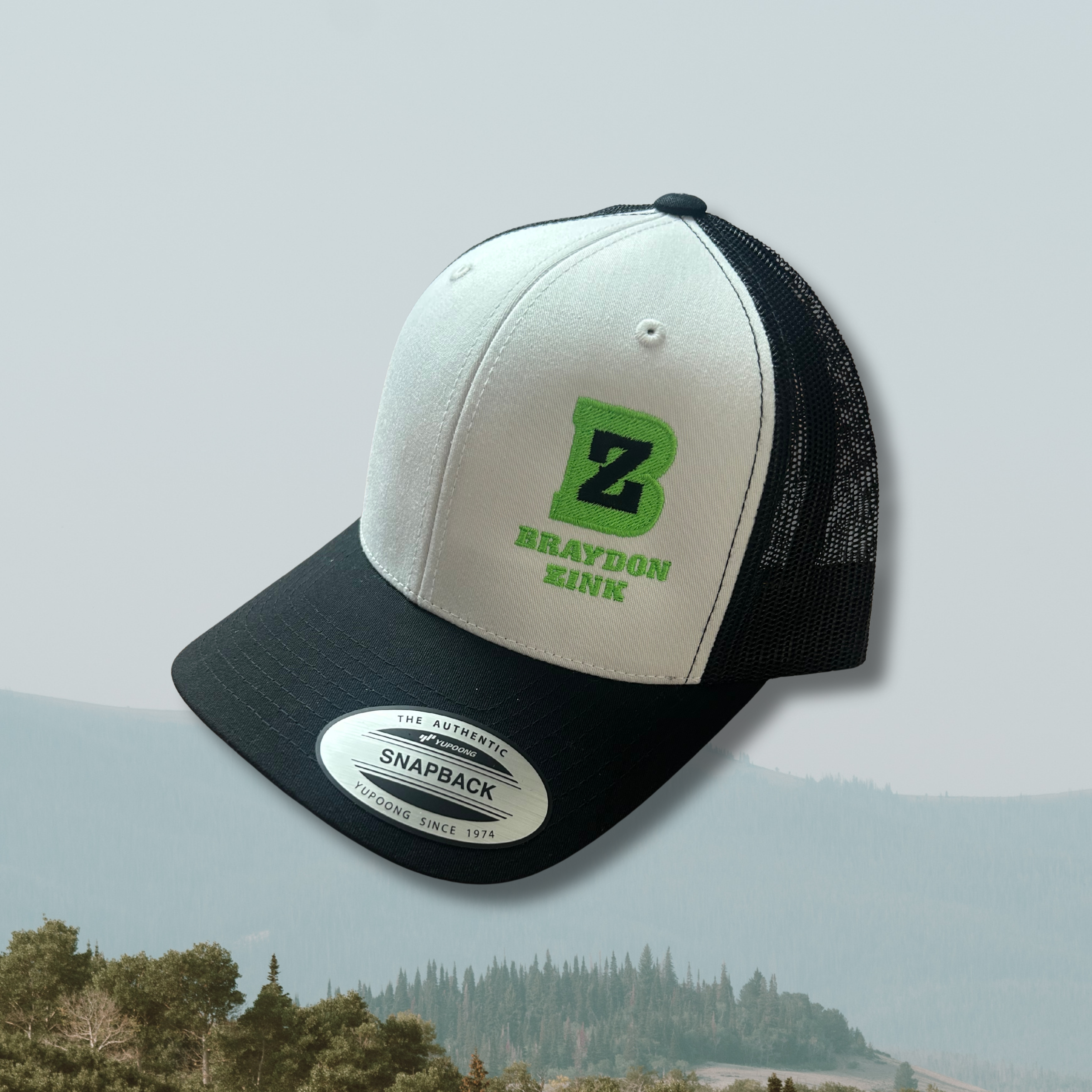 Black, White, & Green Side Logo