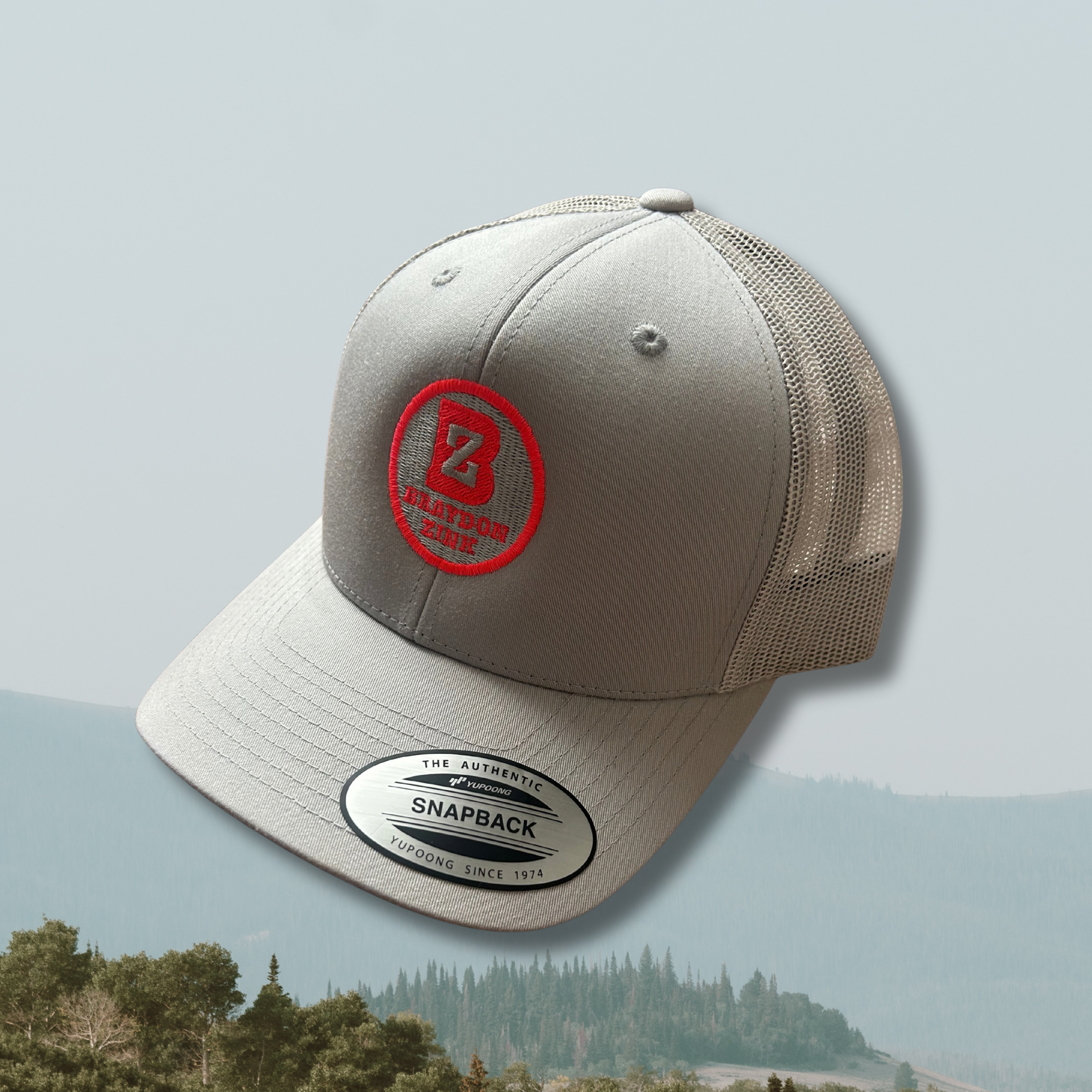 Grey & Red Patch Logo