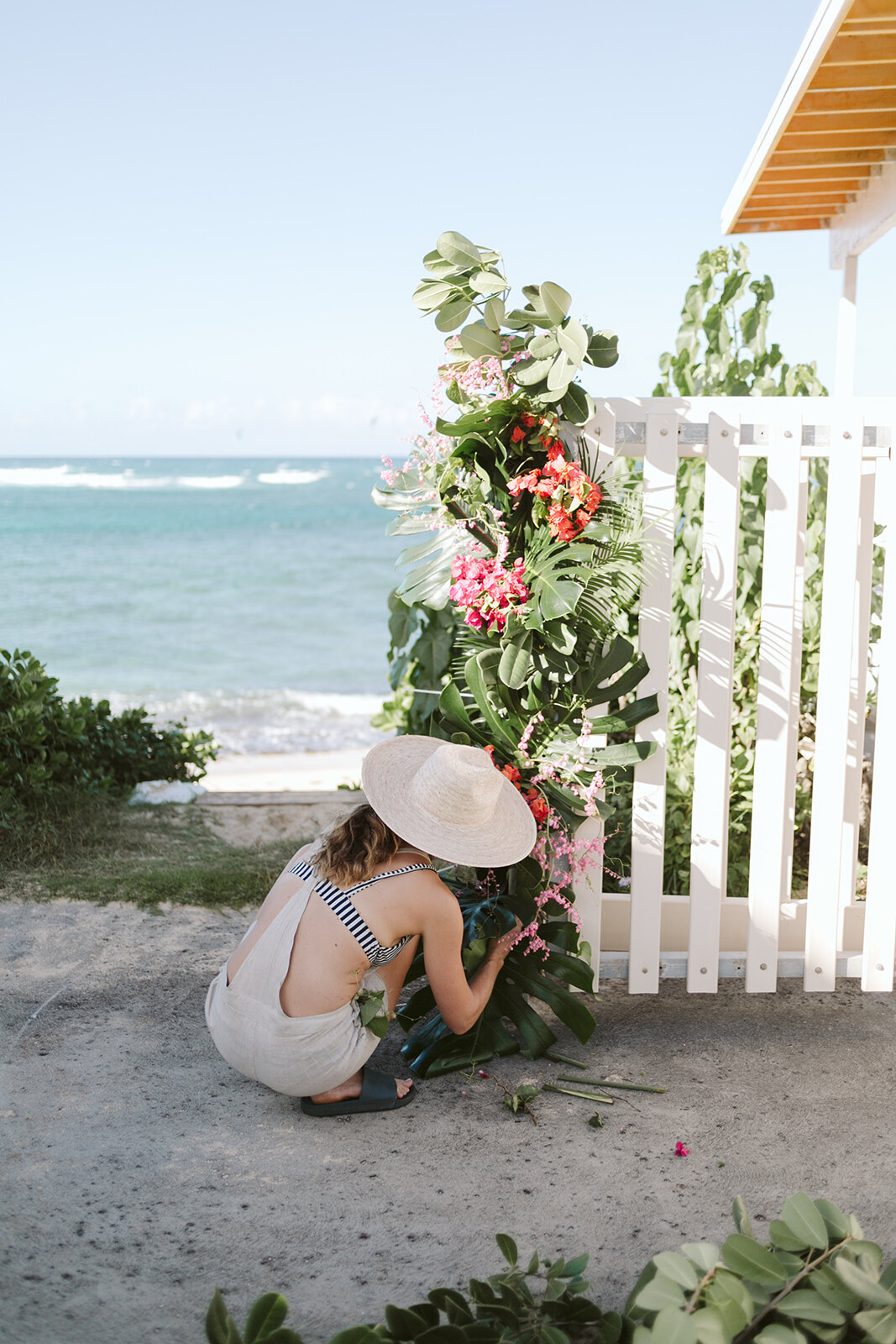 Mokuleia-North-Shore-Hawaii-Beach-House-Wedding-ceremony-arch-florals