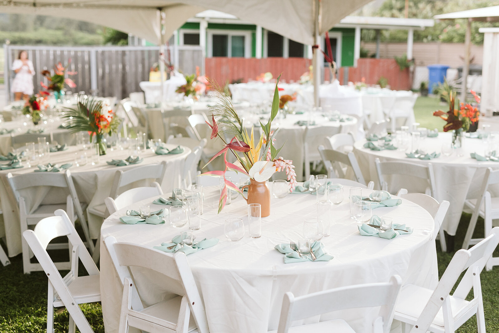 Mokuleia-North-Shore-Hawaii-Beach-House-Wedding-reception-details-floral-centerpieces