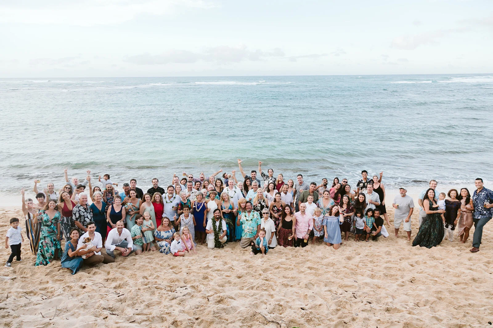 North-Shore-Hawaii-Mokuleia-Beach-House-Wedding-beach-group-photo.jpg