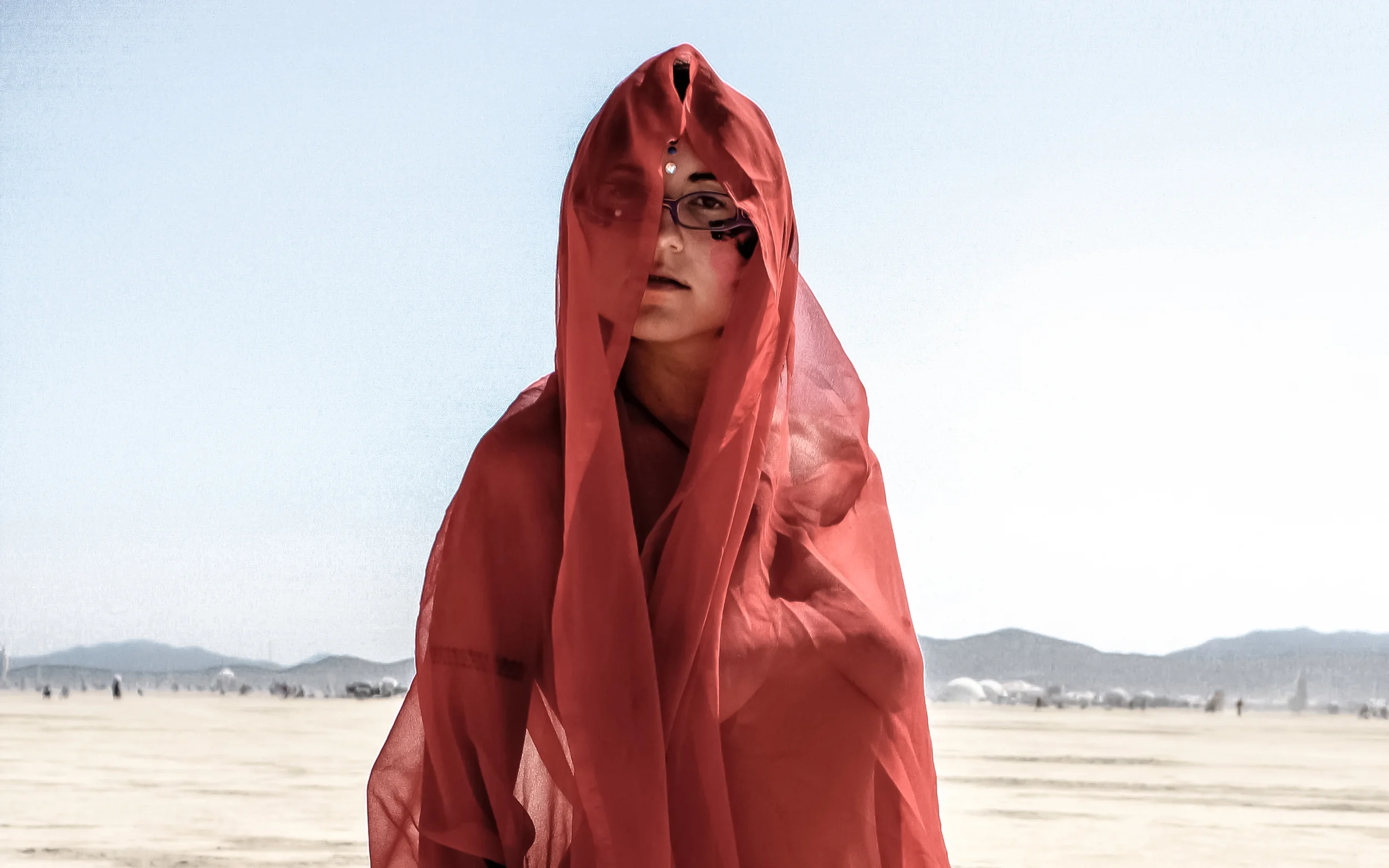  After participating in a seminar focused on plant medicine and remote viewing a woman poses for a portrait. 