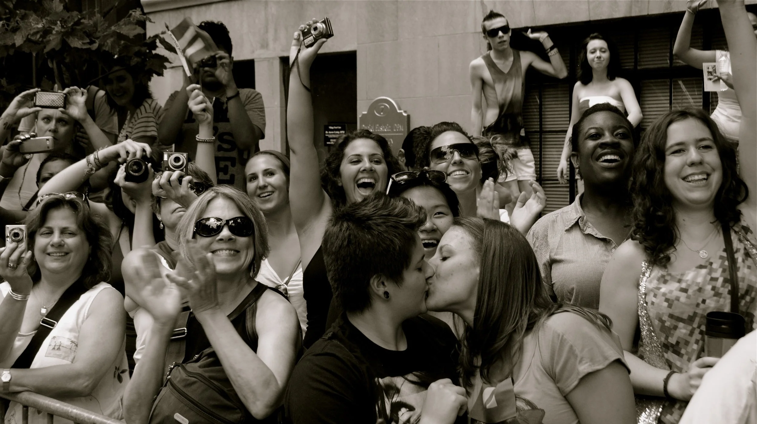  (Archive) NYC. 2011. Legalization of same sex marriage. A celebratory atmosphere lends itself to a sporadic moment of intimacy. 