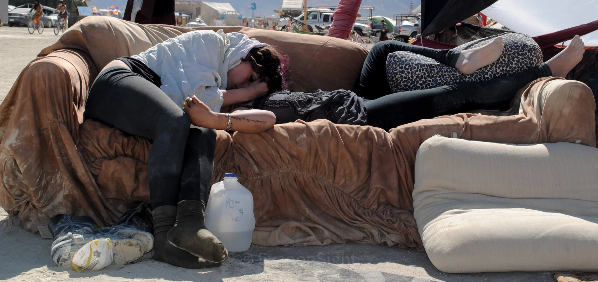 Monday. Post Temple Burn. Noon. While most festival goers are weathering the vehicular exodus 2 friends wait out the gridlock under the Nevada sun.
