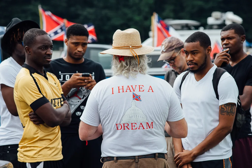 Hundreds gather at Confederate flag rally in Stone Mountain Park, Georgia. 