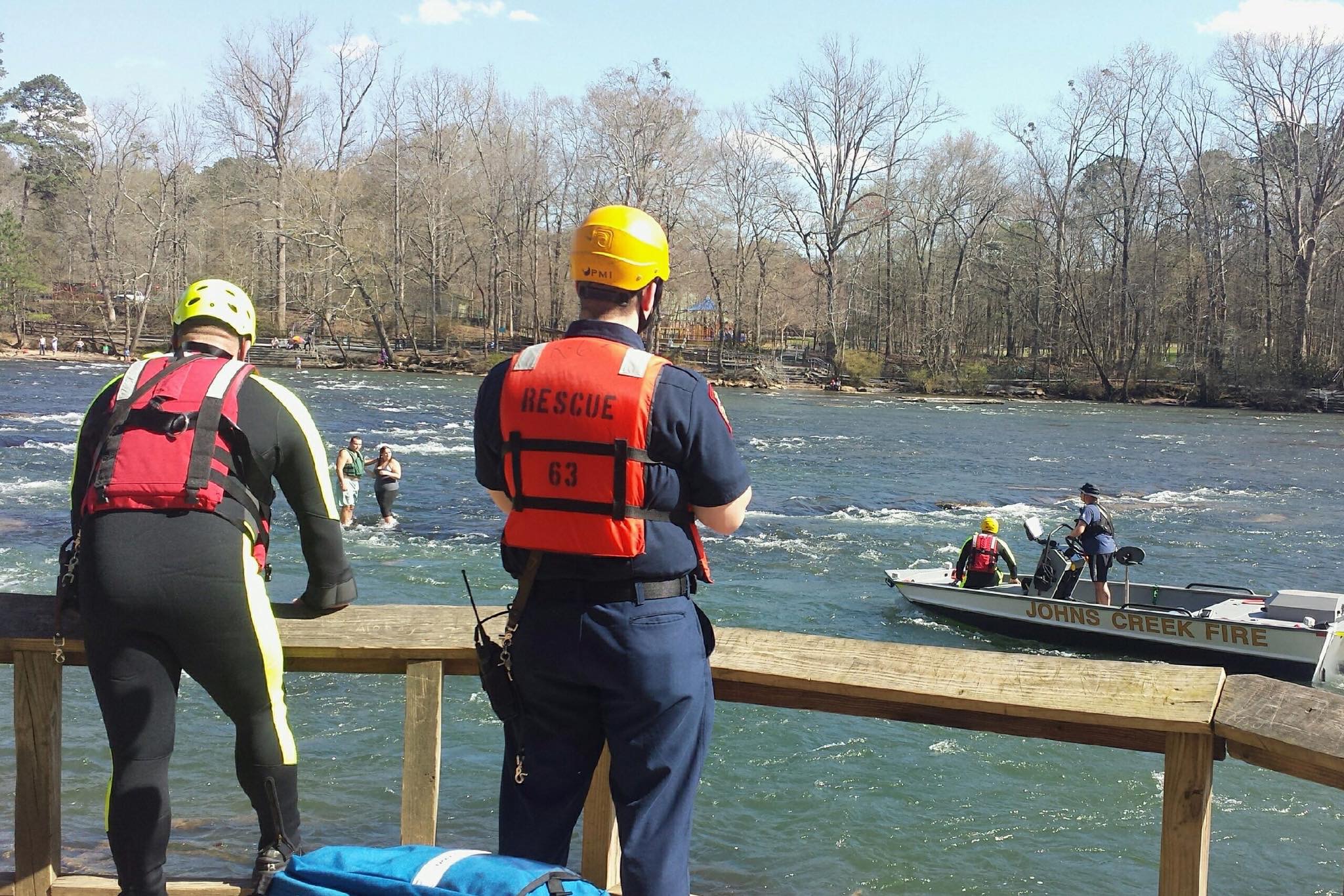 A man and woman were rescued by the Johns Creek Fire Department after they lost their canoe and became stranded in the Chattahoochee River at the Chattahoochee National Recreation Area in Johns Creek, Georgia. Credit: Candra Umunna
