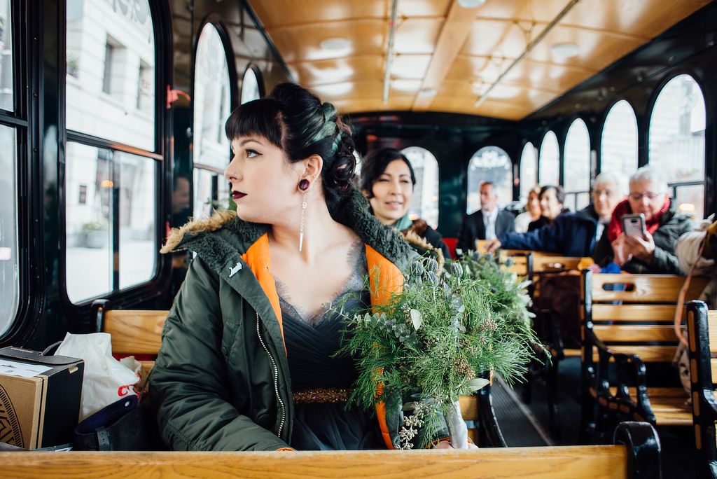 Siobhan's younger sister, Margaret, with Michelle, the maid of honor, sitting directly behind her on the trolley.