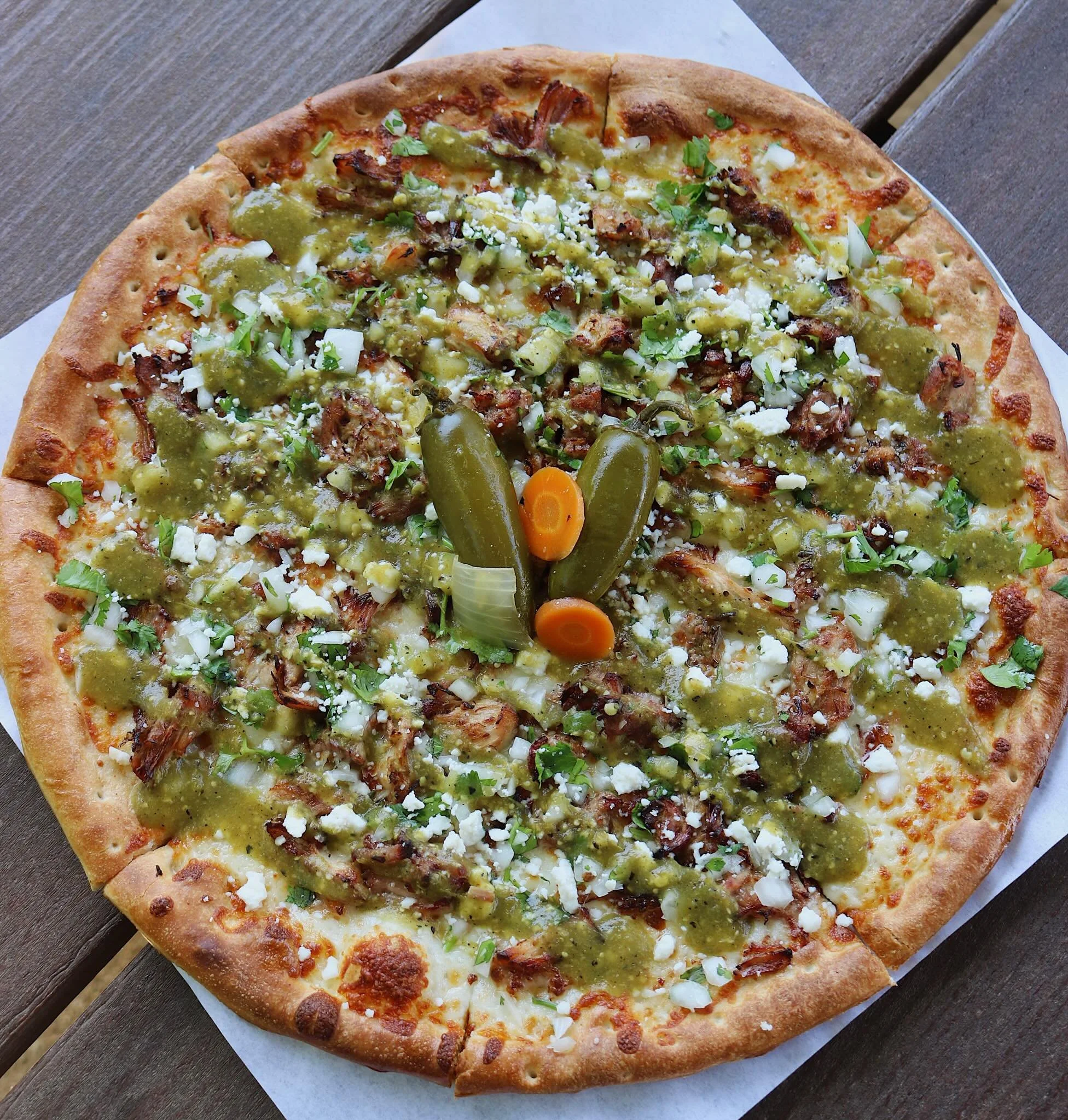 We brought back a good one for May!🍕A refreshed take on our fan-favorite Chile Verde Pizza: braised pork, salsa verde, mozzarella, pickled jalape&ntilde;o, onions, cilantro &amp; queso fresco. 

#InstitutionAleCo #InstitutionAleCoSb
