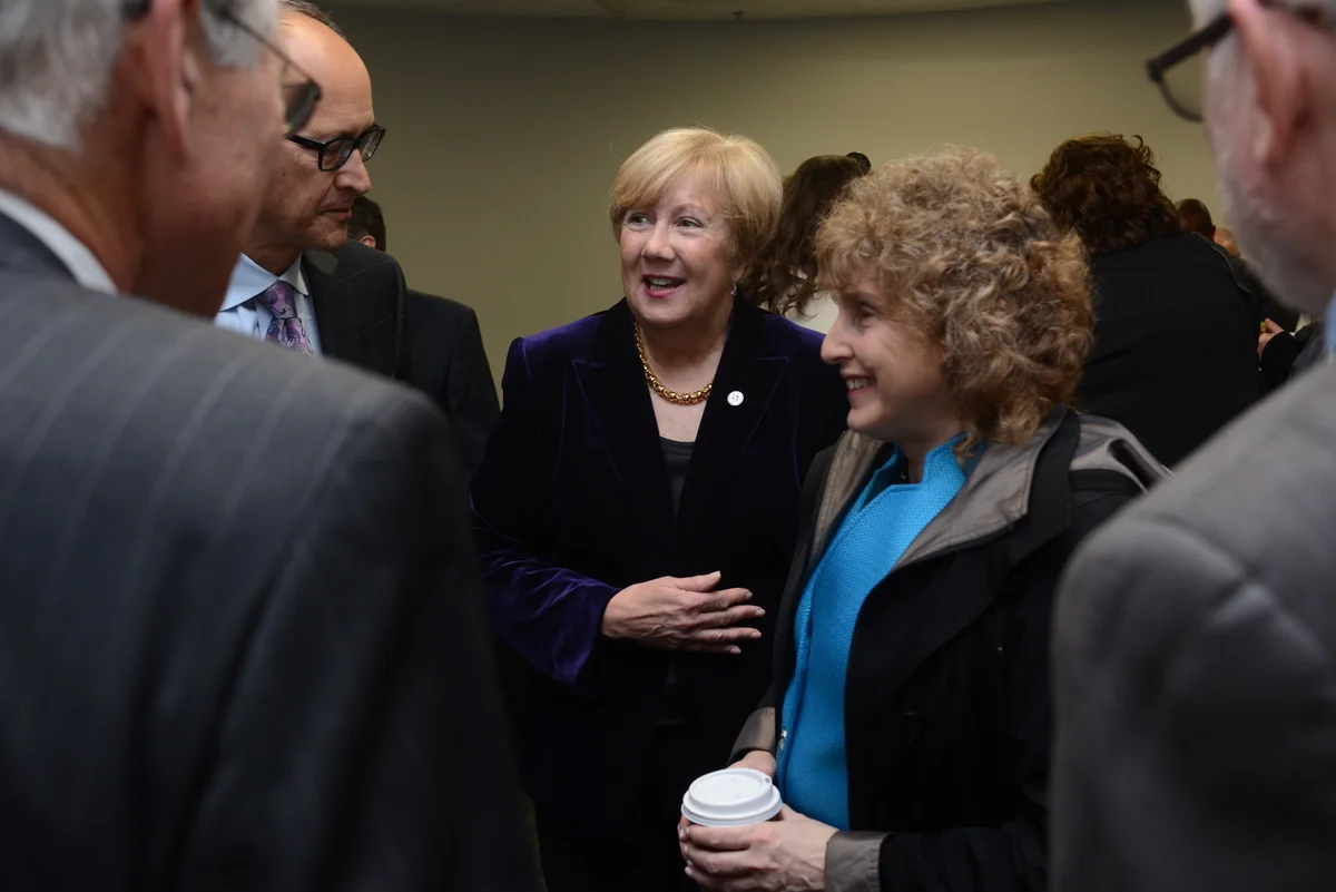 Senator Eileen Donoghue introduces Secretary of Transportation Stephanie Pollack to members of the Lowell Plan board. Photo by Tory Germann