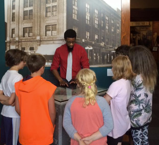 An MTCC tour director teaches Little Rock area students about the history of the MTCC pediment. Help us pass down the story of the Mosaic Templars to younger generations and teach them about the contributions African Americans made to Arkansas culture by making a donation today. 