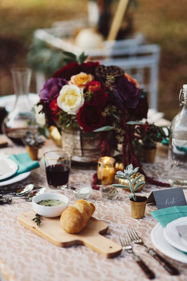  I love the mini succulents in the gold pots! Such a beautiful table from  Style Within Reach  