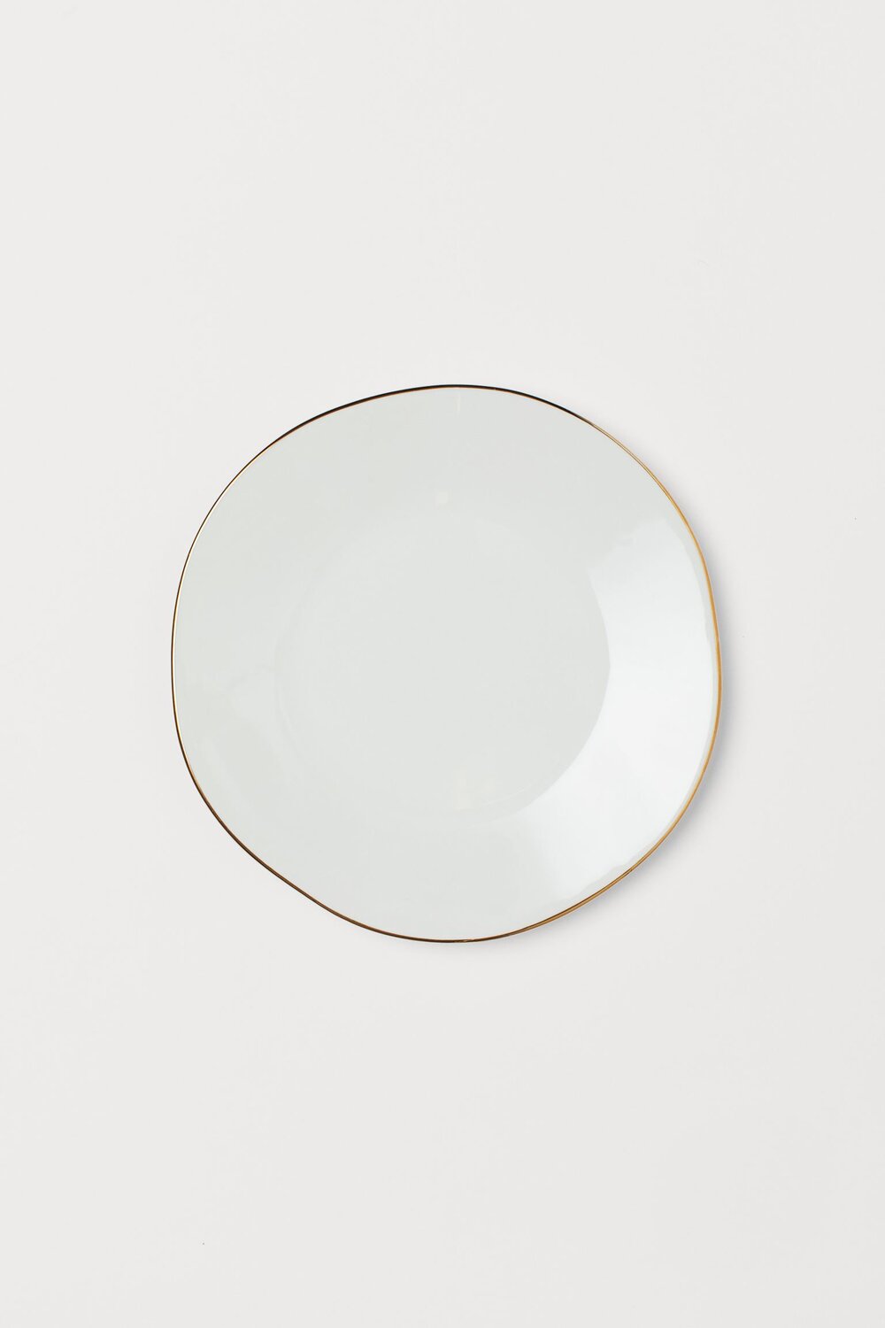 White ceramic gold rimmed plate