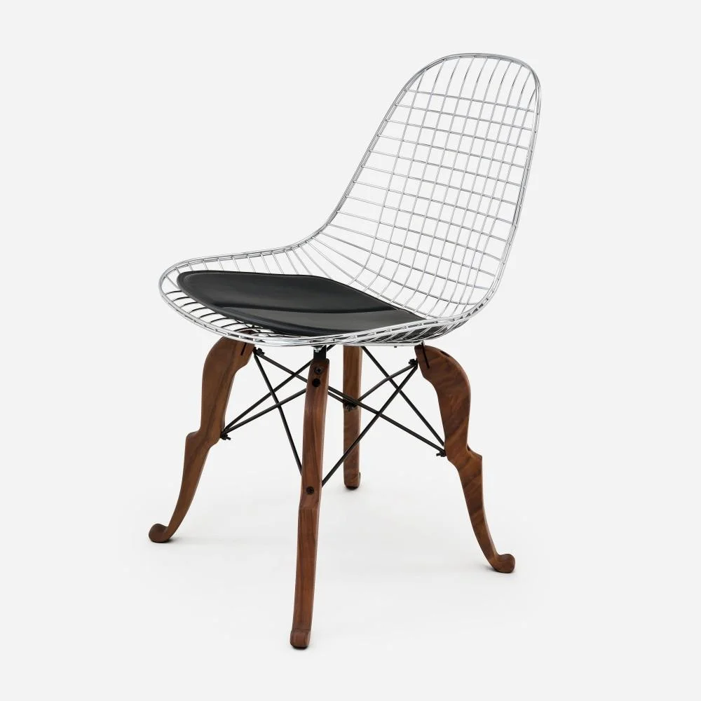 modernica-casestudy-wirechair_princecharles_walnutbase_chrome_blackpad_45-2_1728x.jpg