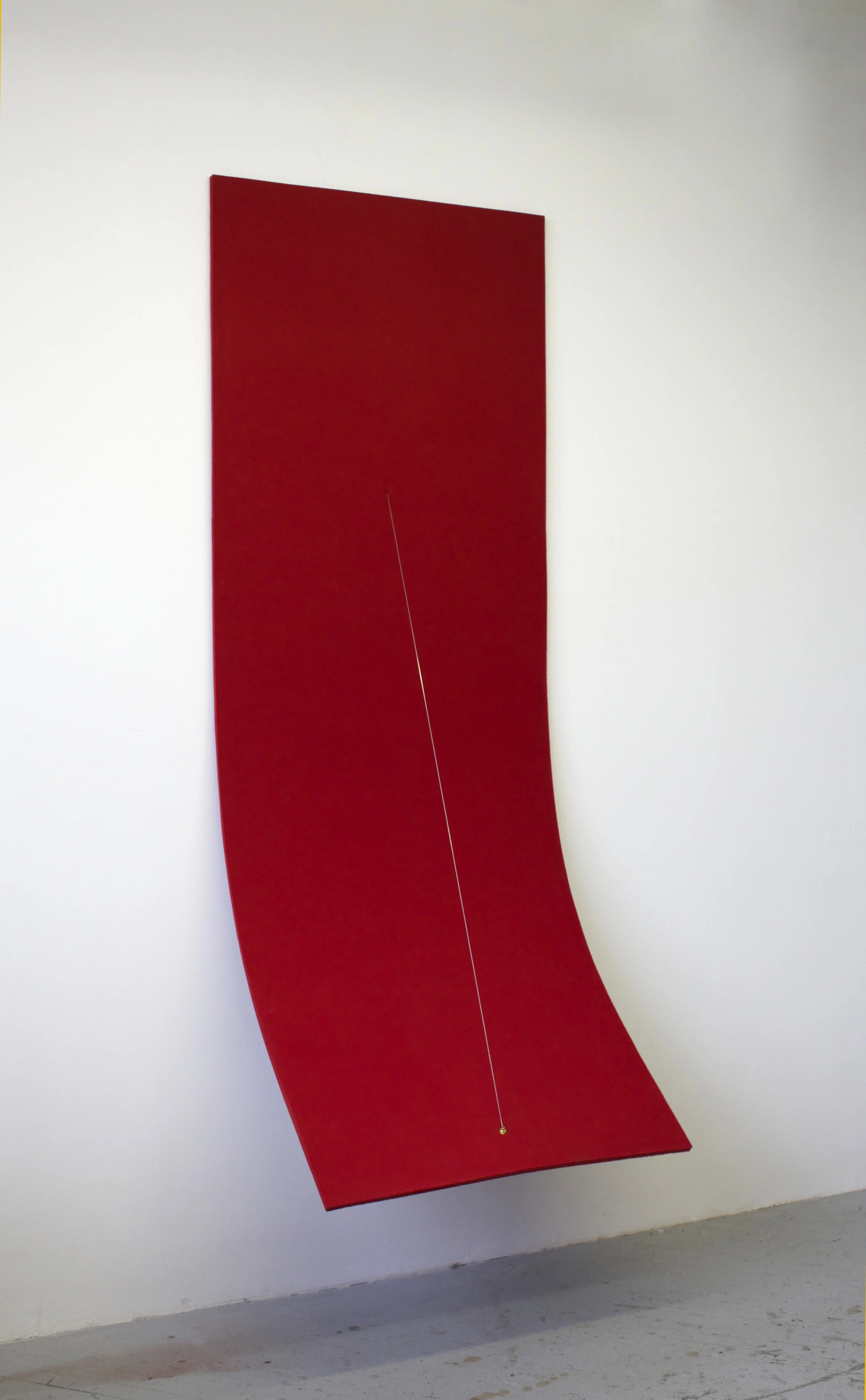 Naama Tsabar , Work on Felt (Variation 6) (2015). 97.63 x 34.87 x .56 inches. Felt, carbon fiber, epoxy, archival PVA, bass guitar tuner, piano string. ( Photo : Naama Tsabar )