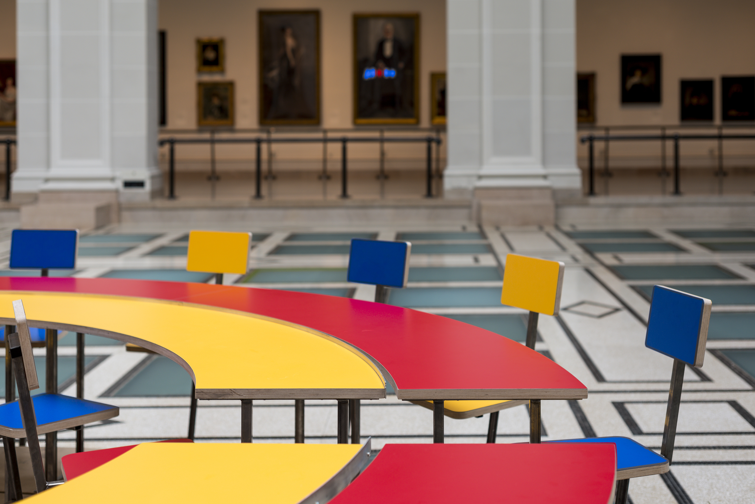  Detail of  Until the Cows Come Home  (2014), as installed at the Brooklyn Museum in 2014. Steel, neon, laminated mdf, pine; 60 x 168 in. (table), 24 x 60 in. (neon centerpiece). ( photo : Giles Ashford) 