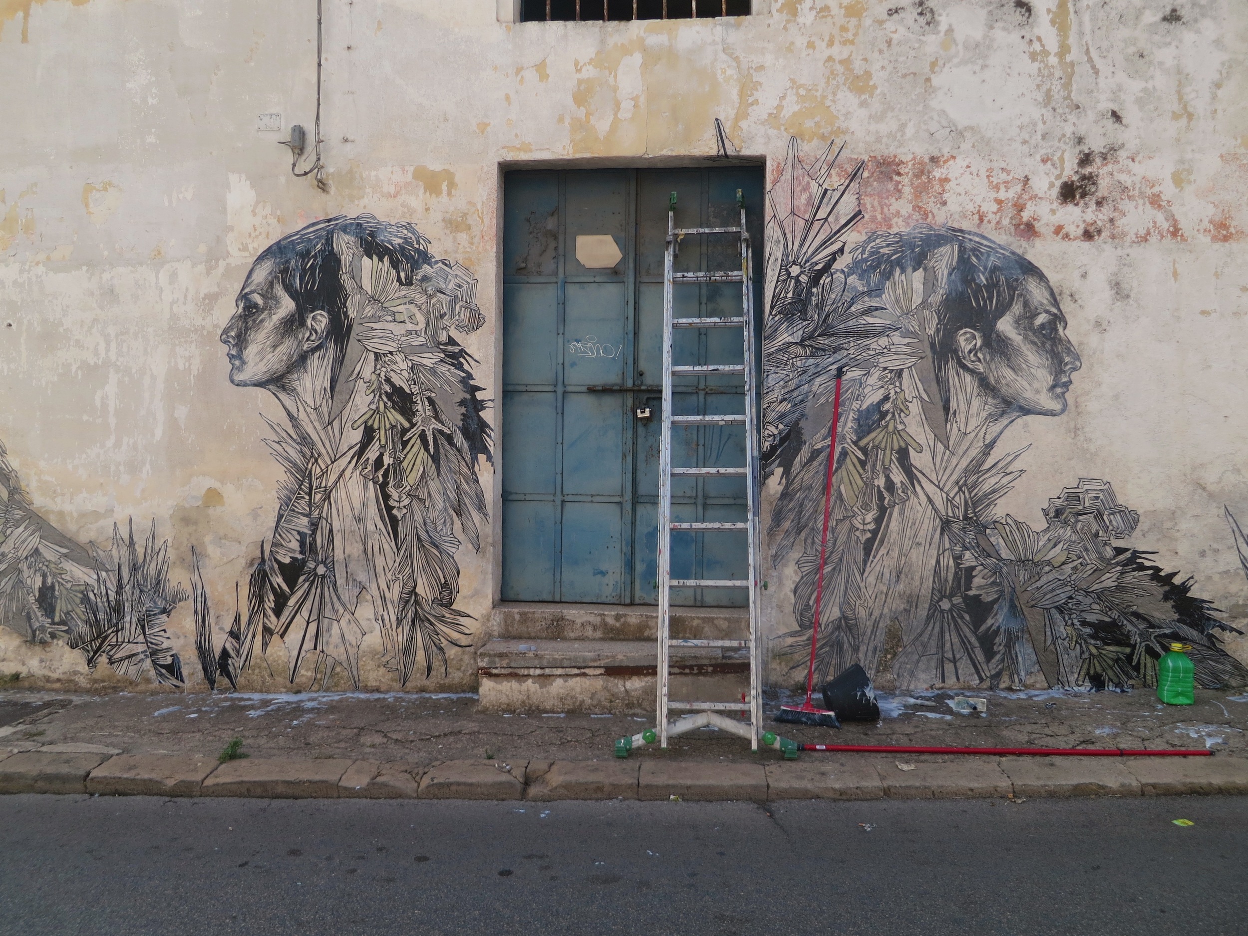  A 2013 street paste in Grottaglie, Italy. ( Photo : Swoon Studio) 