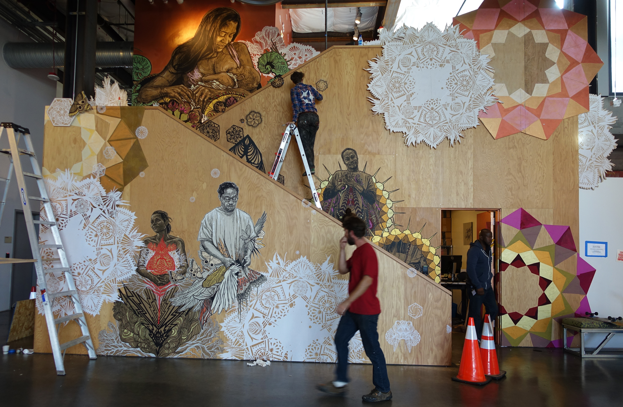  Swoon and her team install a site-specific work at Facebook Headquarters in Palo Alto, California. ( Photo : Swoon Studio) &nbsp; &nbsp; 