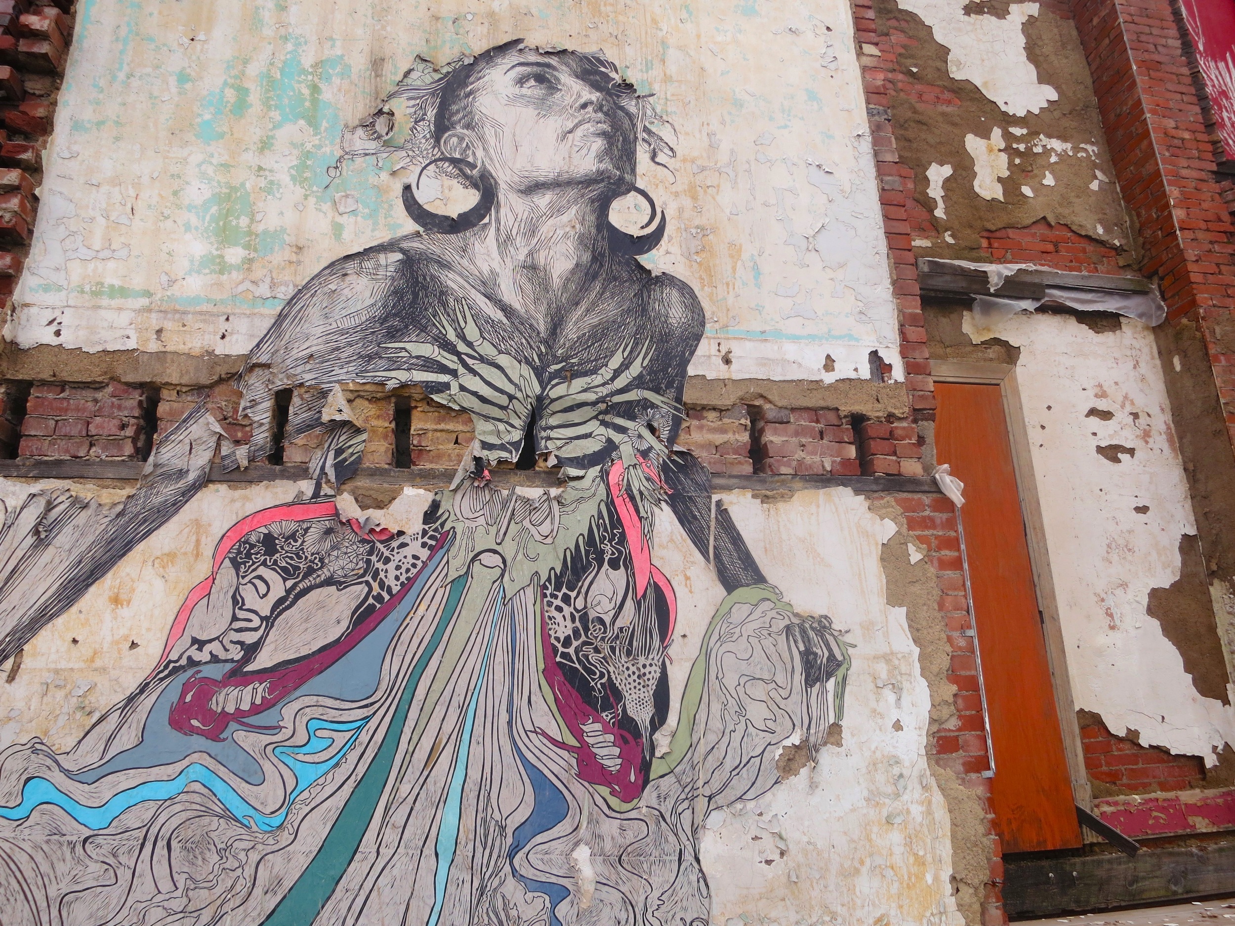An example of the portraiture motifs Swoon employs across her work, the sea goddess Thalassa was the subject of a site-specific installation at the New Orleans Museum of Art as well as a two-story paste on the exterior of an abandoned church in Brad