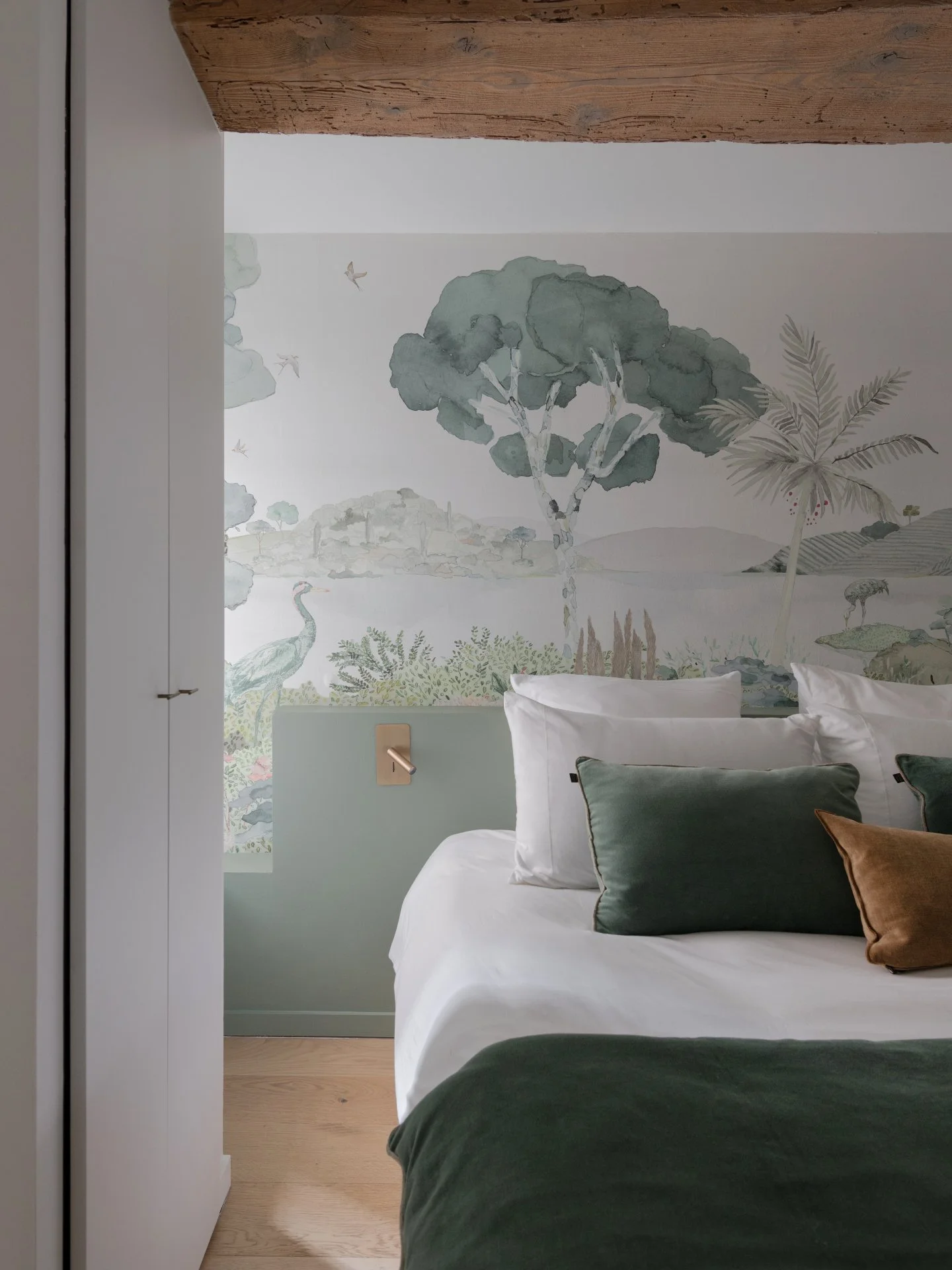 In this beautiful Lyon apartment imagined by interior designer @caroline_leynaud , our Laguna Verde panoramic wallpaper becomes the heart of the bedroom &mdash; a serene headboard that sets the tone for a soft, peaceful atmosphere.

Its watercolor la