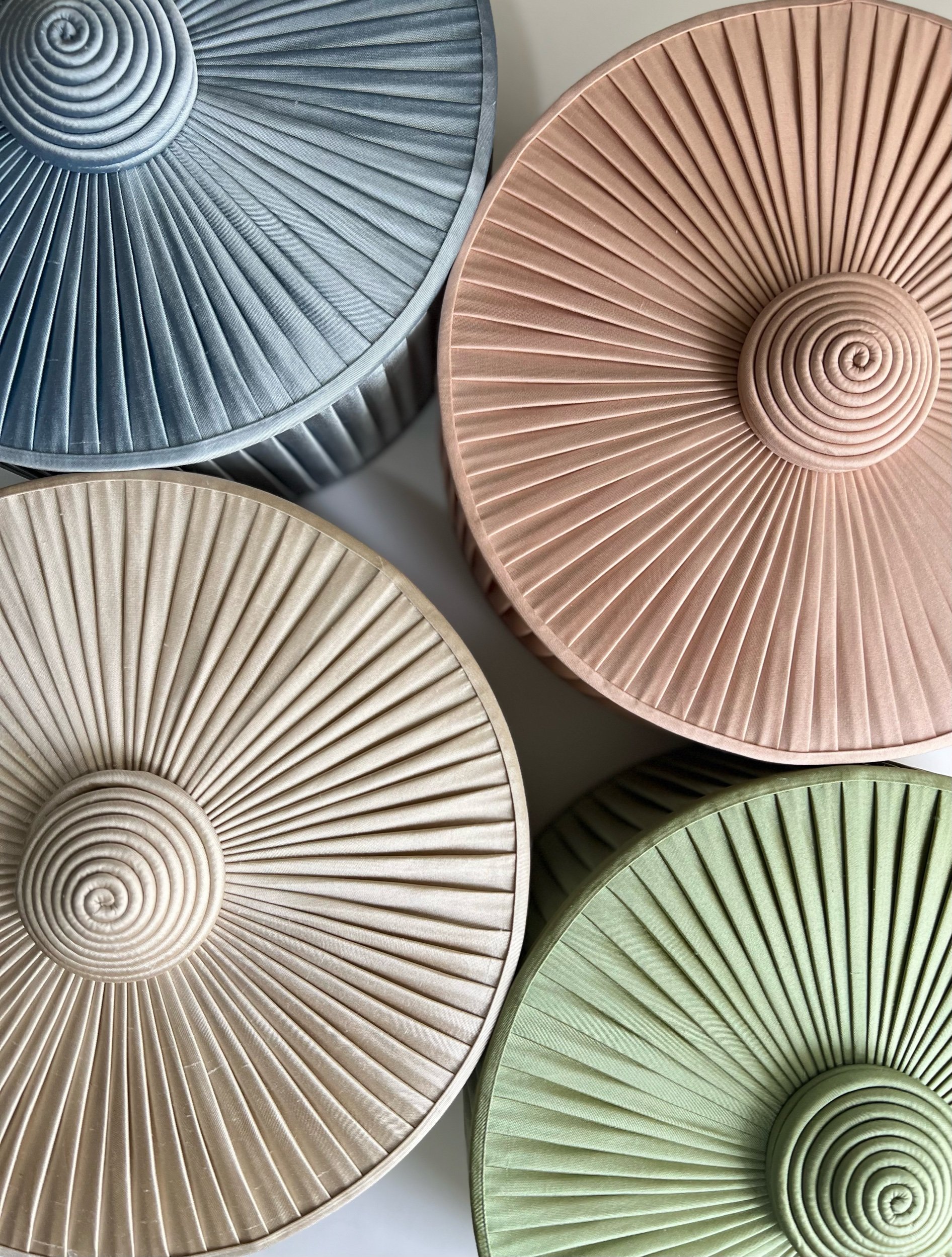 The Arts Club pleated shades with a spiral knot