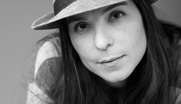 Chuchie Hill is a Spanish/British Director, Creative Director, and Producer born on the Island of Mallorca where she redirected her competitive sailing life passion to film and advertising. She obtained a Bachelors degree in Film Directing and has since won a One Show Entertainment Award for directing the campaign that introduced Jambox to the Brazilian market featuring Snoop Dogg, shortlisted at the International Festival of Creativity-Cannes Lions, won a Human Interest Award in Monaco, a Streamy Award for Best Branded Entertainment Web Series for Lexus awarded by Ogilvy, and a nomination at the Los Angeles Women’s International Film Festival and Miami Film Festival. She’s also known for her BBC commissioned video art installation ¨Laughing Portraits Pursuit of Happiness¨. Chuchie’s festival world began with her short film ¨Hola to the World¨, starring Jena Malone and Hugh Bonneville. Influenced by her studies at MASSANA Design & Art School in Barcelona, she launched TrickorTreat Visual Factory, a web design studio that has shaped the visual identity and branding of clients for ten years. Chuchie´s documentary ¨In the Sea You´ll Find Me¨, about young Mexican surf champion Walter Caloca, led to her acceptance into the Ocean Artist Society and board of directors for UAPO while also launching a non profit corporation under the name of In The Sea Productions. One of Chuchie´s latest directorial pursuits marked the first time in television history where viewers participated in a real-time commercial experience via Facebook.