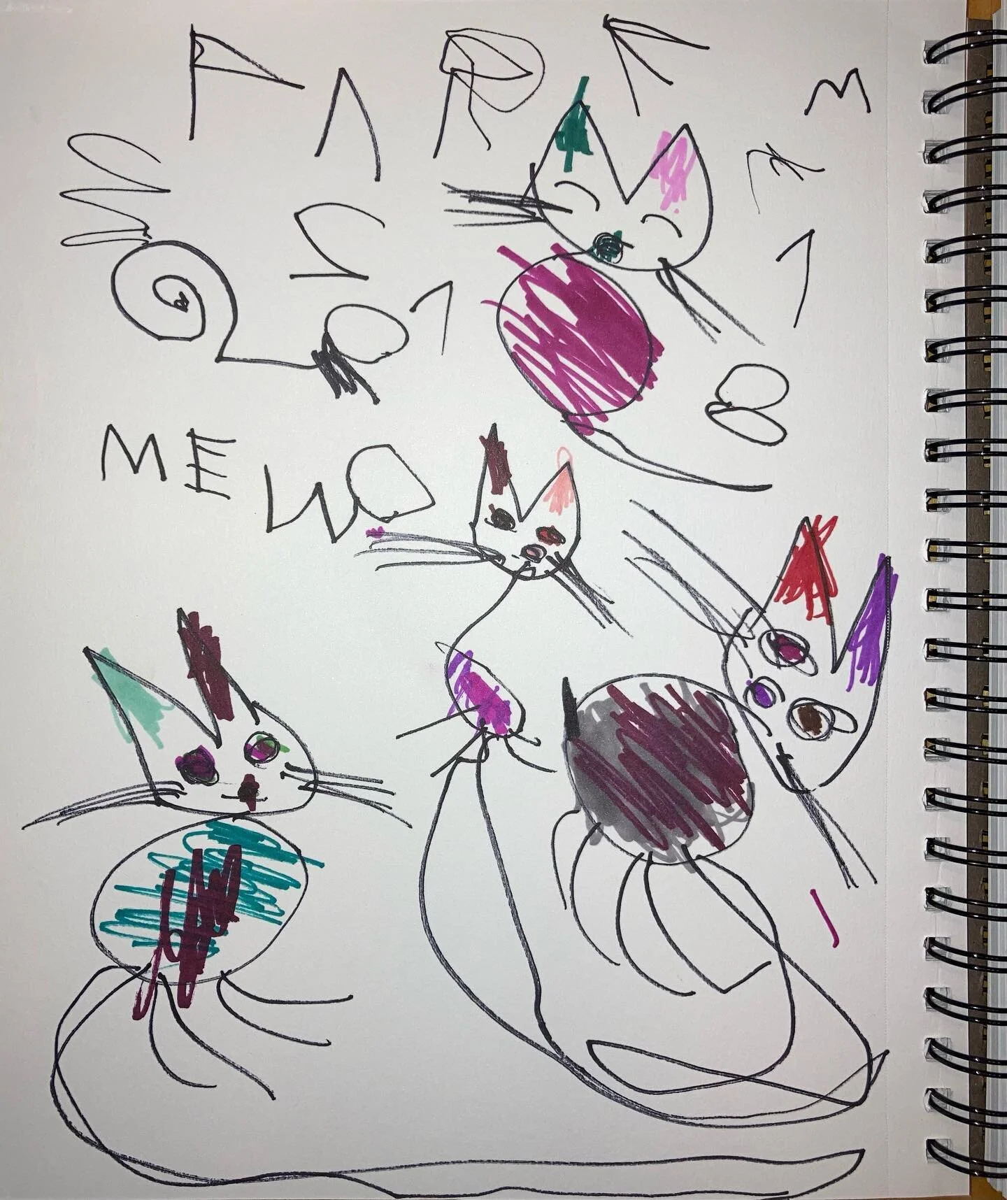 Left: That’s “PURR” (with her trademark inverted U) at the top. I was not consulted on the spelling of “MEOW”, but think that’s a pretty great first try. The (backwards) numbers are coming from the cat with closed