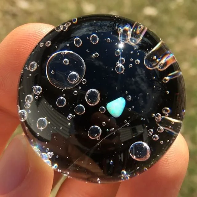 Foam marble with white opal and swirly backing. 1.5 inches in diameter. 
#glassofig #wonderful #heady