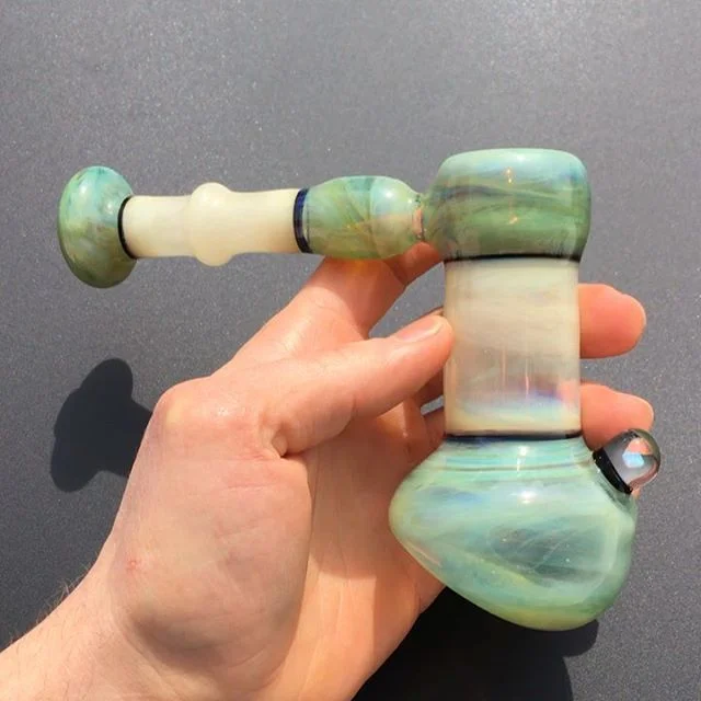 Hand mixed green and cloudy white ☁️, white opal and 3 hole diffuser. Happy Friday everyone! ✌️ #glass #glassofig #glassart #functionalglass #functionalglassart #heady #headyglass #710 #420 #boro33 #hammerbubbler #whiteopal #glasshammer #hammertime