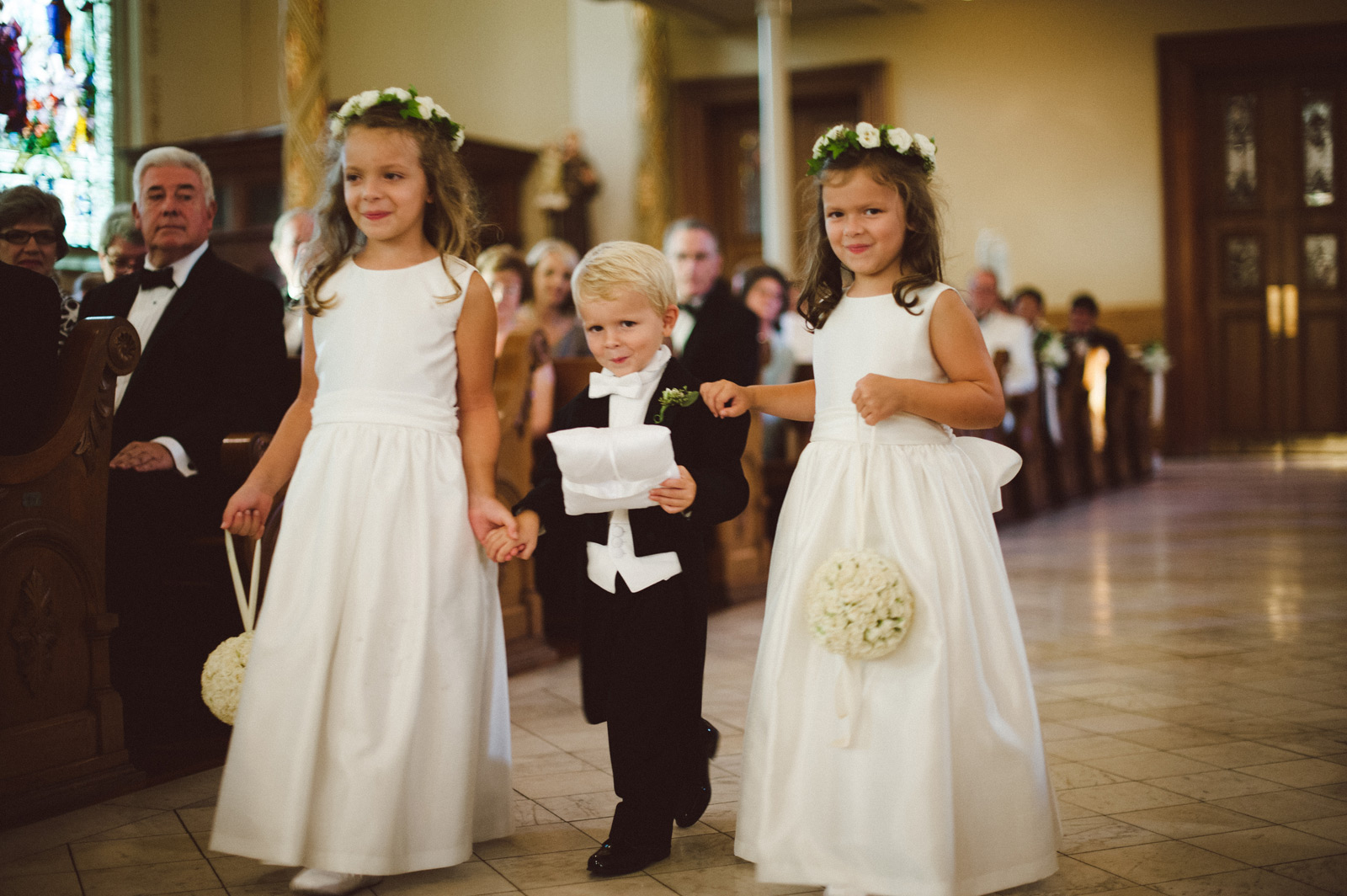 Ring bearer and flower girls with halos and palmanders