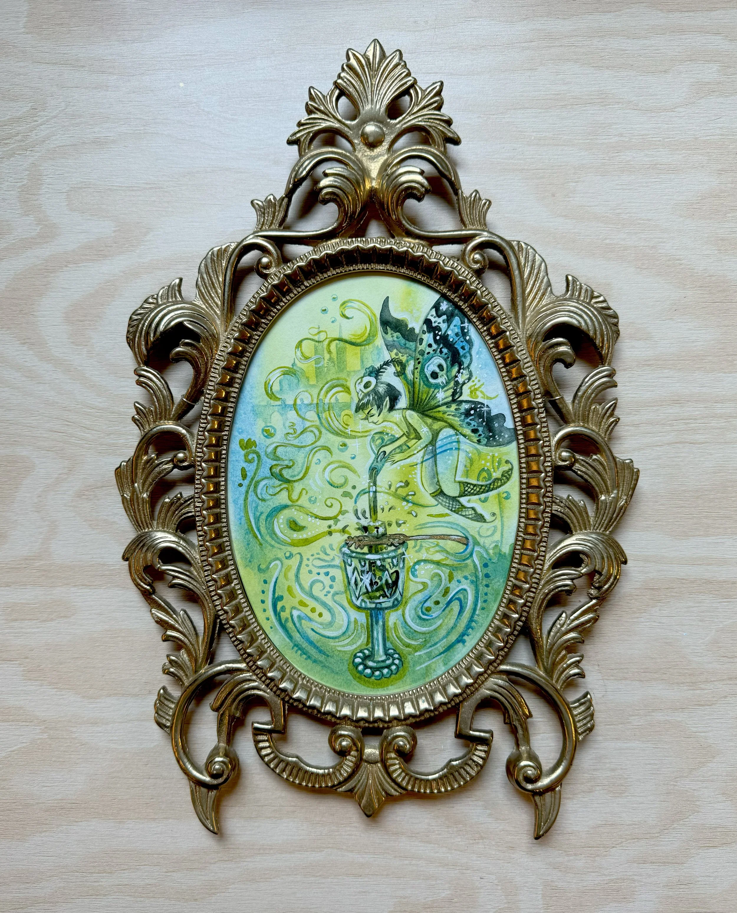   This piece will be available on Friday September 6th, 2024 at 6:00pm MST!   "Absinthe Faery" watercolor, 5" x 7",  2024, $225  To purchase this painting, please contact the gallery at 303-974-5172. &nbsp;  We are happy to ship the painting if you a