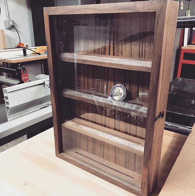 And a quick project for a friend.  Walnut sides, veneered panel, glass door and #blackhardware ! #woodworking #coin #display