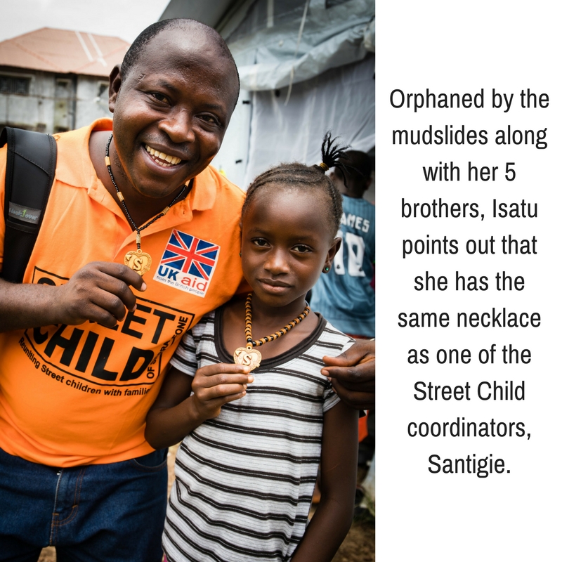 A girl orphaned by the Freetown mudslides pointed out that she has the same necklace as one of the Street Child coordinators, Santigie..jpg