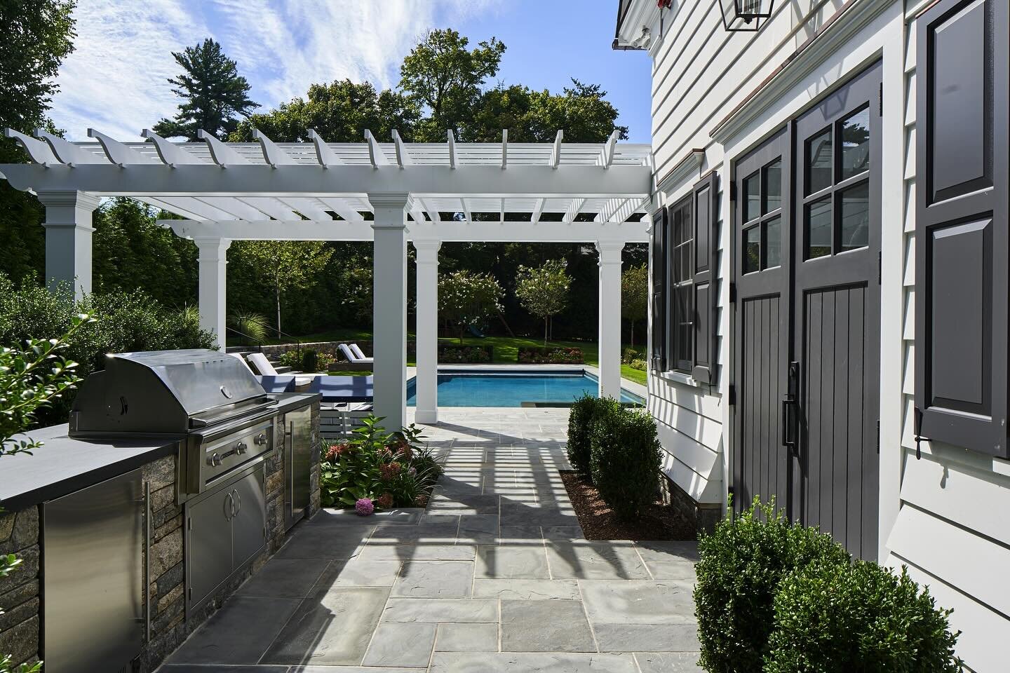 Fun family outdoor haven with grill, pool, shady and sunny seating areas, and of course plants.  Carefully planned in collaboration with Roz Young Architects , Marika Meyer Interiors, Cum Laude Group.  The most exciting part for me is what you can&rs