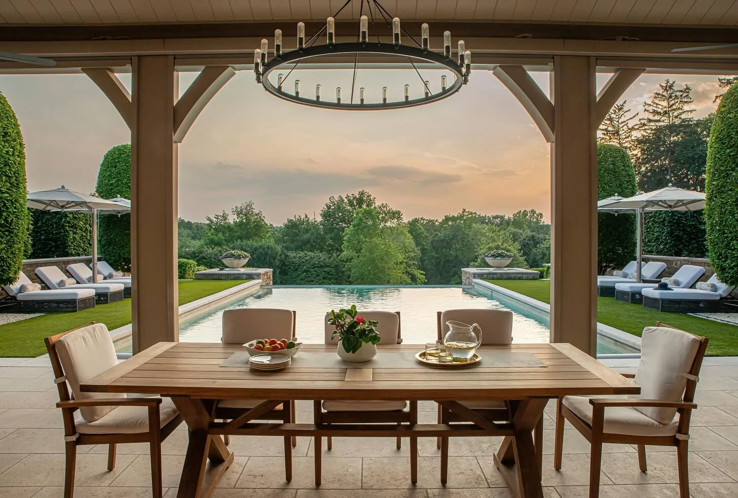 We LOVE hot summer nights at our long time client&rsquo;s pool. It sits on top of a ridge taking in views of treetops, sky and glorious sunsets. Originally laid out back in 2010, we recently  updated and expanded it to incorporate a screened shade st
