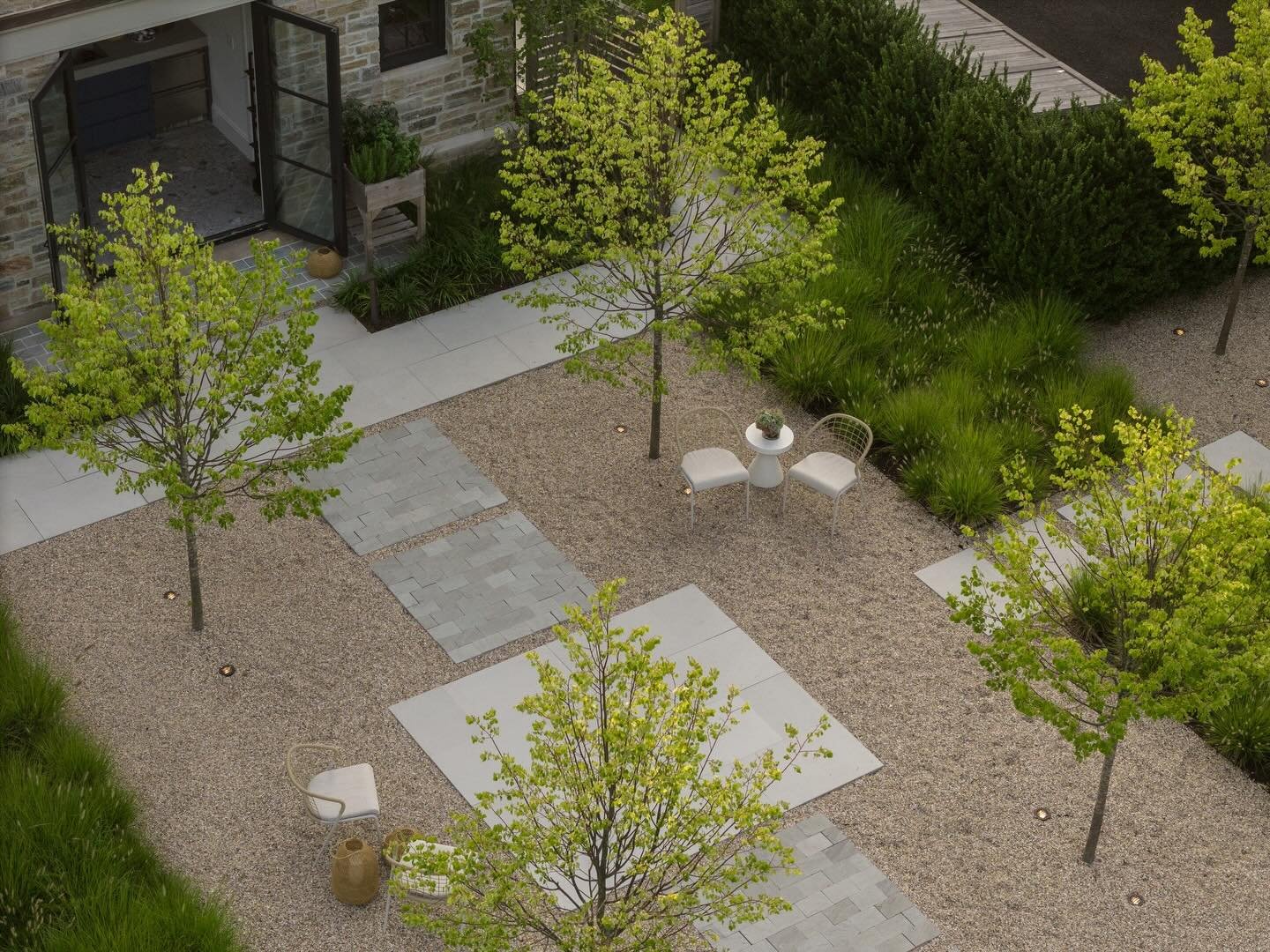 Seen from above, the courtyard&rsquo;s rhythm comes into focus &mdash; geometry, greenery, and gravel working quietly in harmony.

Team credits @cumlaudegroup @moranogroup @rosamundyoungarchitecture @monicafrieddesign @jonathanhopk @philmonat 

Photo