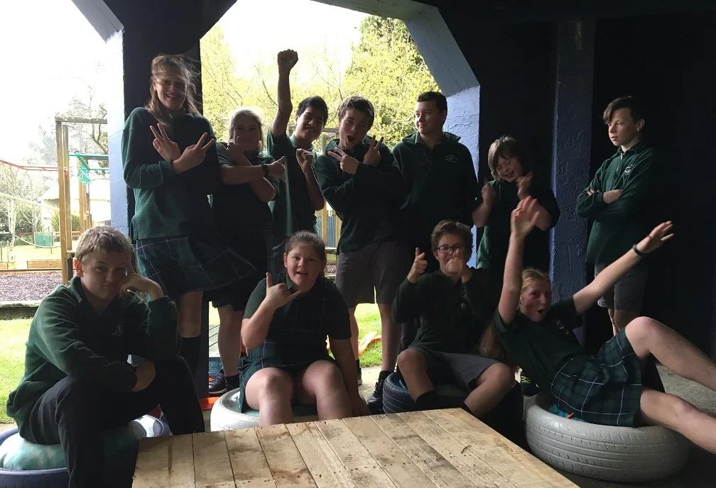 St Partrick's students celebrate the successful completion of their upcycling project.