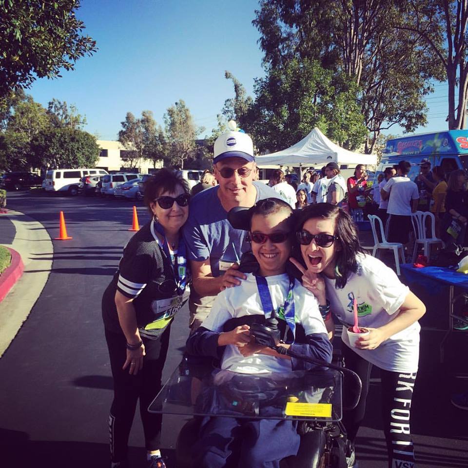 Christina's Mother, Christina's Father, Ben, and Christina at the 2nd Annual Global Genes Denim Dash