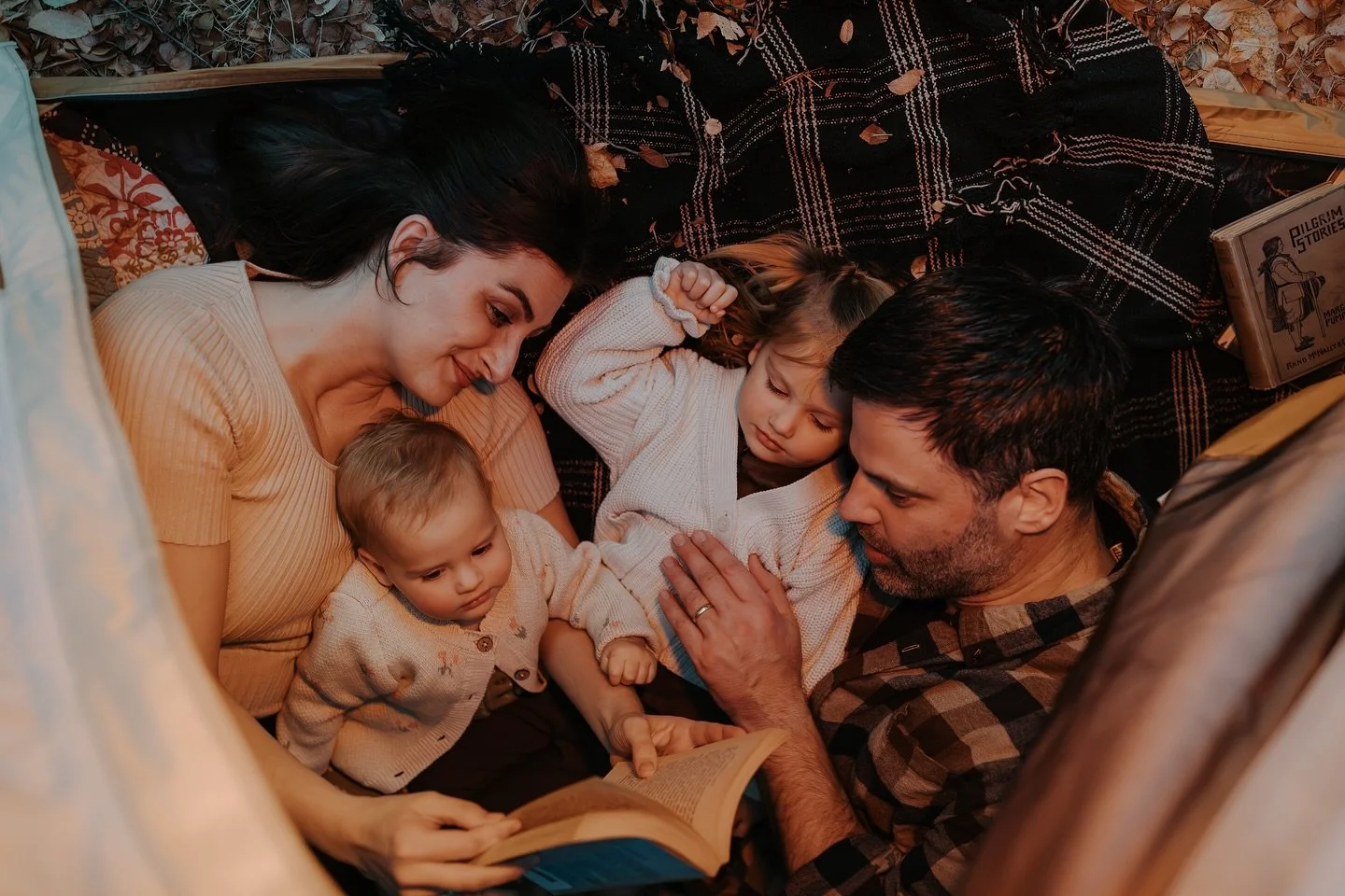 This family camps together often, so when we started dreaming up their next session, it only made sense to meet them right where they were: tucked into a tent, books in hand, babies in their laps.

Because that&rsquo;s what these sessions are really 