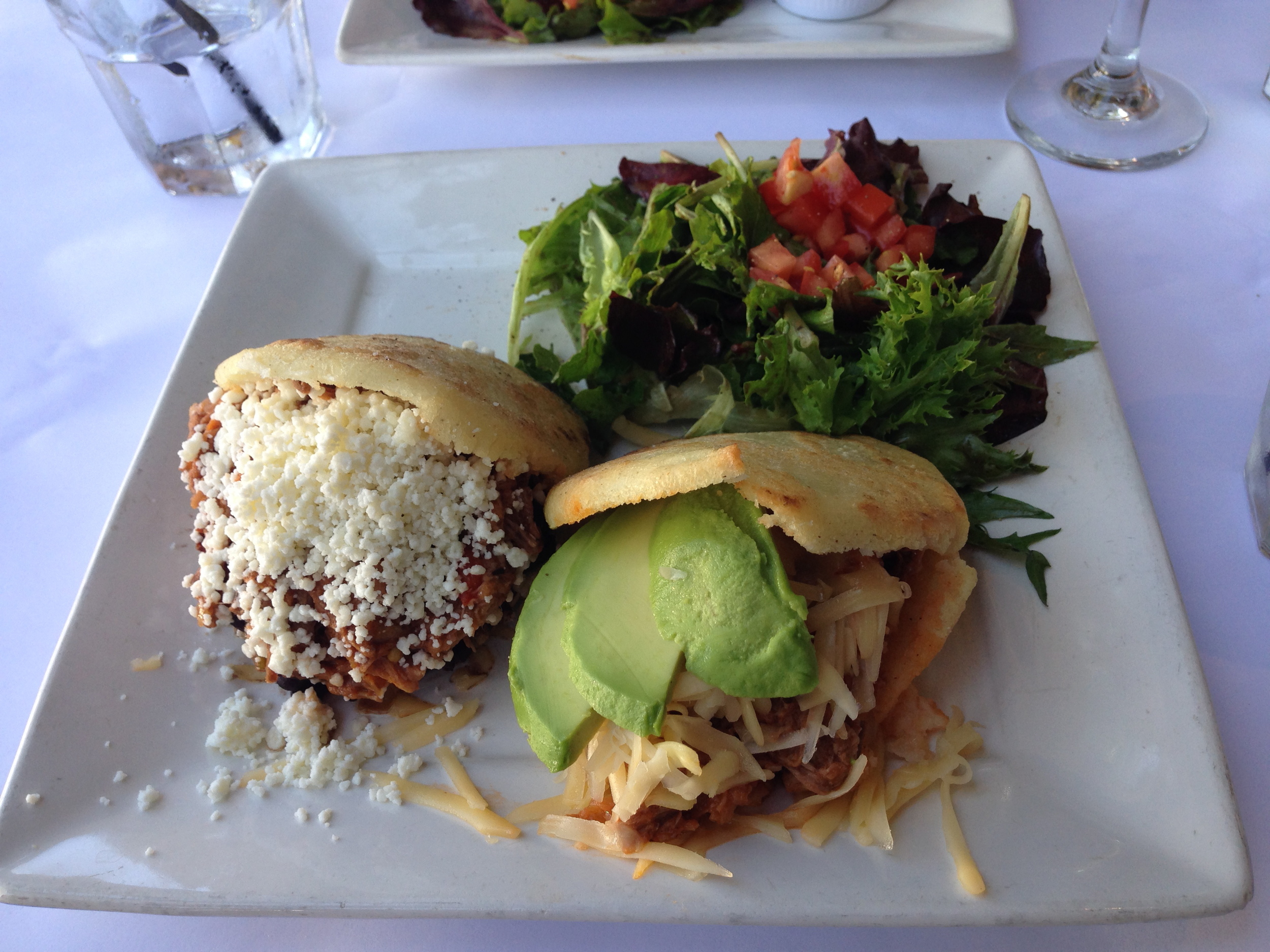 Left: Pabellon (My favorite Arepa). RIght: Pelua with Avocado Added