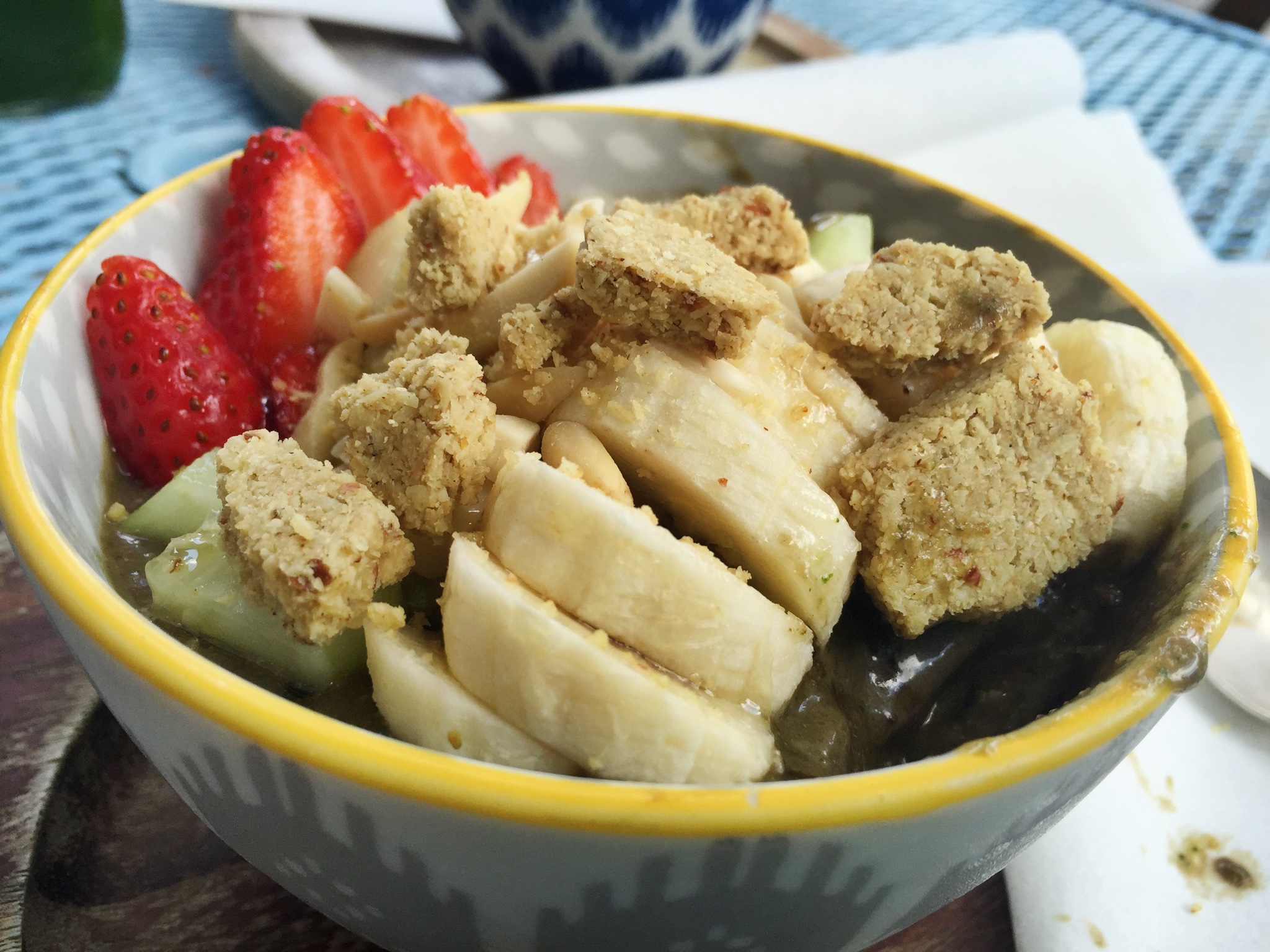 The hemp granola that they use at Revolucion isn't gluten free, so I made my own granola by crumbling a Rawnola Bar on the bowl. I would definitely recommend it.