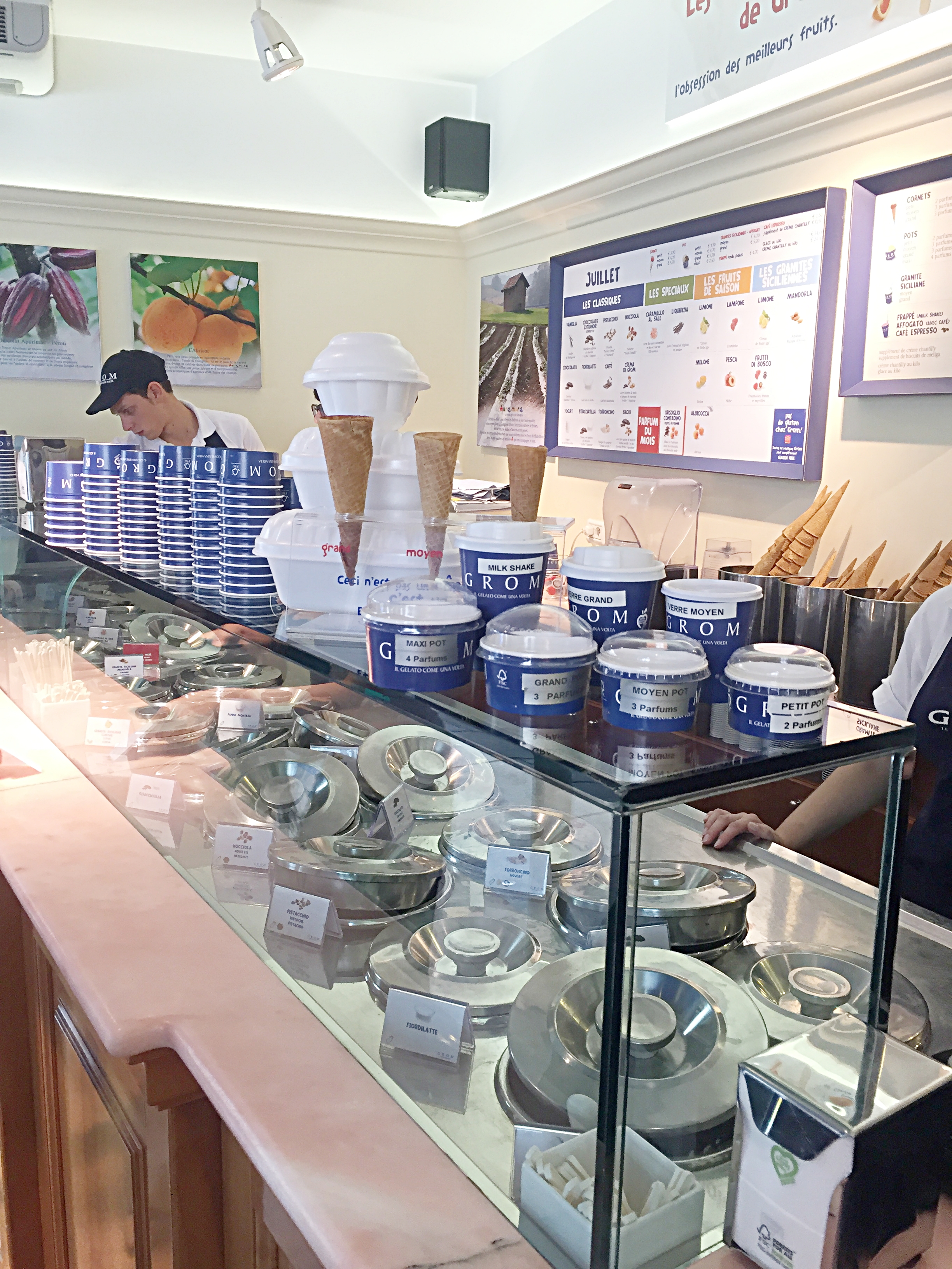 You order first at the counter by picking your size and if you want a cone or a cup. Then you pay and move around to the other side to wait to be called to tell them what you want.