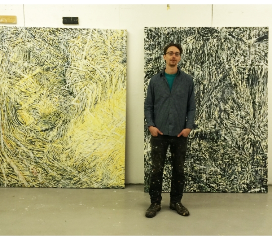 Keenan Derby photographed with his work.