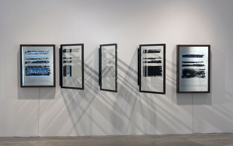 A Book and A Medal II (Unredacted) (2014 - 2015) by Edgar ArceneauxSeven parts, silver, painting on mirrored glass, handcrafted steel frame and light boxes41.50 in H x 160 in W x 4.50 inPhoto by Robert Wedemeyer, Courtesy of the artist and…