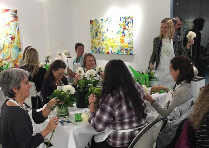 Alice leading a flower arranging class at Abigail Ogilvy Gallery