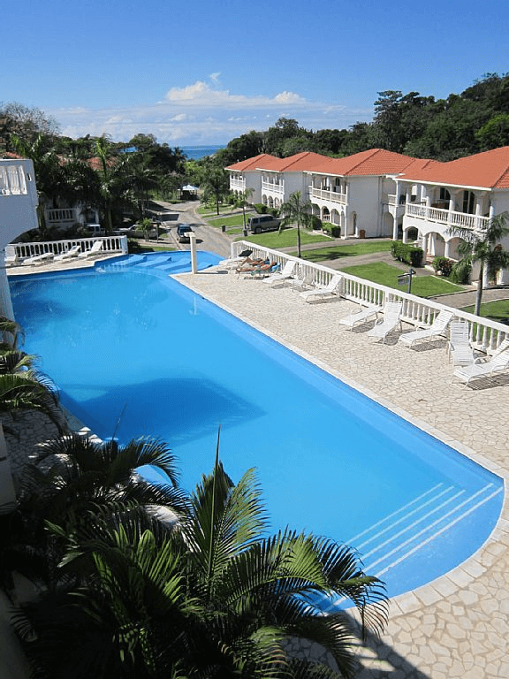 Sunset Villas pool Caribbean Colors Rentals.png