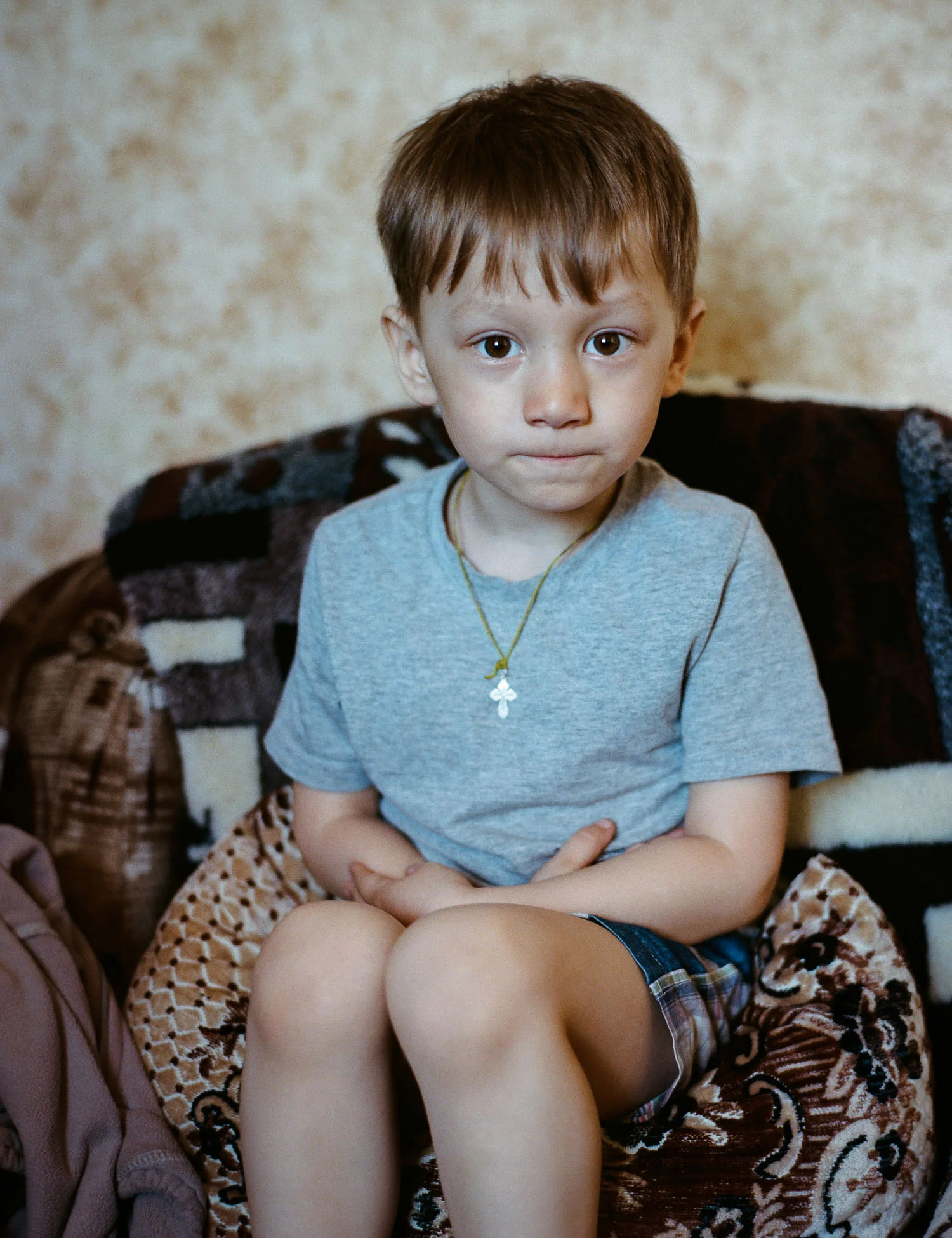 Nikolay’s son is preparing to tell us a Poem which he learned for us. Photo: Contax 645 + Kodak