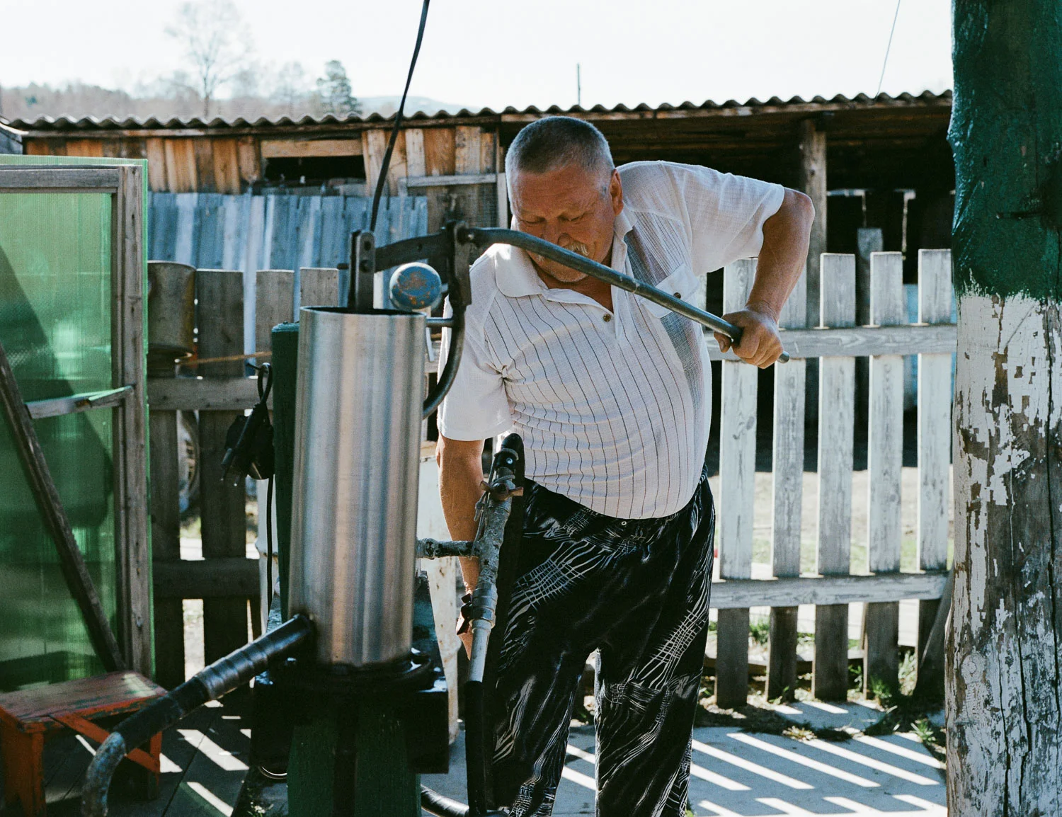 Getting fresh water from the well. Photo: Contax 645 + Kodak