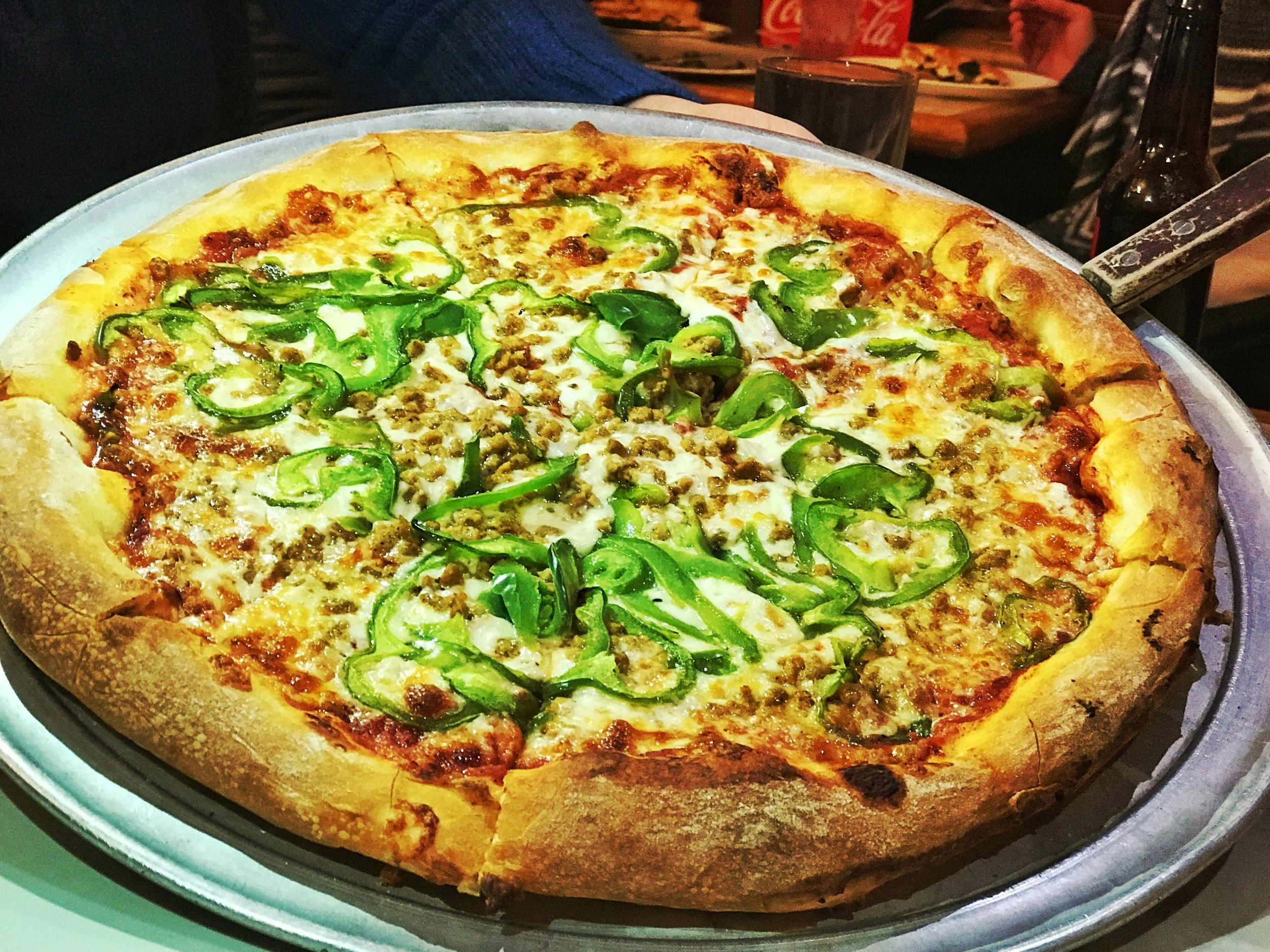 The classic sausage and green peppers pizza. This pizza was perfectly cooked, sturdy, and toppings evenly spread out. 