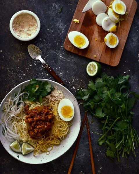 Khauk Swe Thoke (Noodle Salad) A hearty salad filled with flavors and textures. Typically served with hard boiled egg, a choice of chicken or pork. There are so many different kinds of noodles you can order for this dish; flat, round, curried, tamarind, rice-based, bean-based. (photo credit to @ limeandcilantro )
