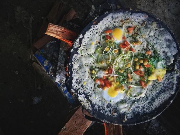 Savory Pancake (Yay Mont) A traditional snack that is popular on the street made of rice flour, boiled egg, and assorted vegetables. (photo credit to @ limeandcilantro )